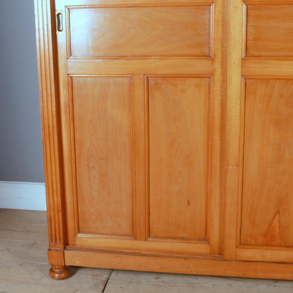 Late 19th C French fruitwood housekeepers cupboard / linen cupboard with sliding doors. This cupboard can be fully flat packed to go upstairs. Supplied with 2 shelves. 1880.

Dimensions
62.5 inches (159 cms) wide
25 inches (64 cms) deep
97