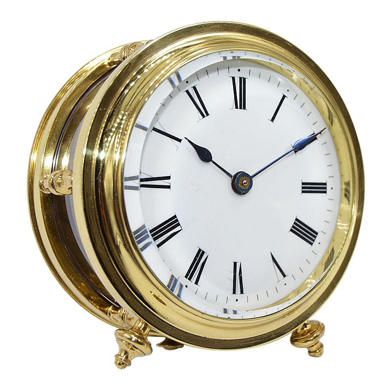 FACTORY / HOUSE: French Fusee
STYLE / REFERENCE: Desk Clock
METAL / MATERIAL: Polished and Lacquered Brass with all Original Glass
CIRCA / YEAR: 1890's
DIMENSIONS / SIZE: 4.5 inches
MOVEMENT / CALIBER: Key Wind Platform Lever 11 jewel 
DIAL / HANDS: