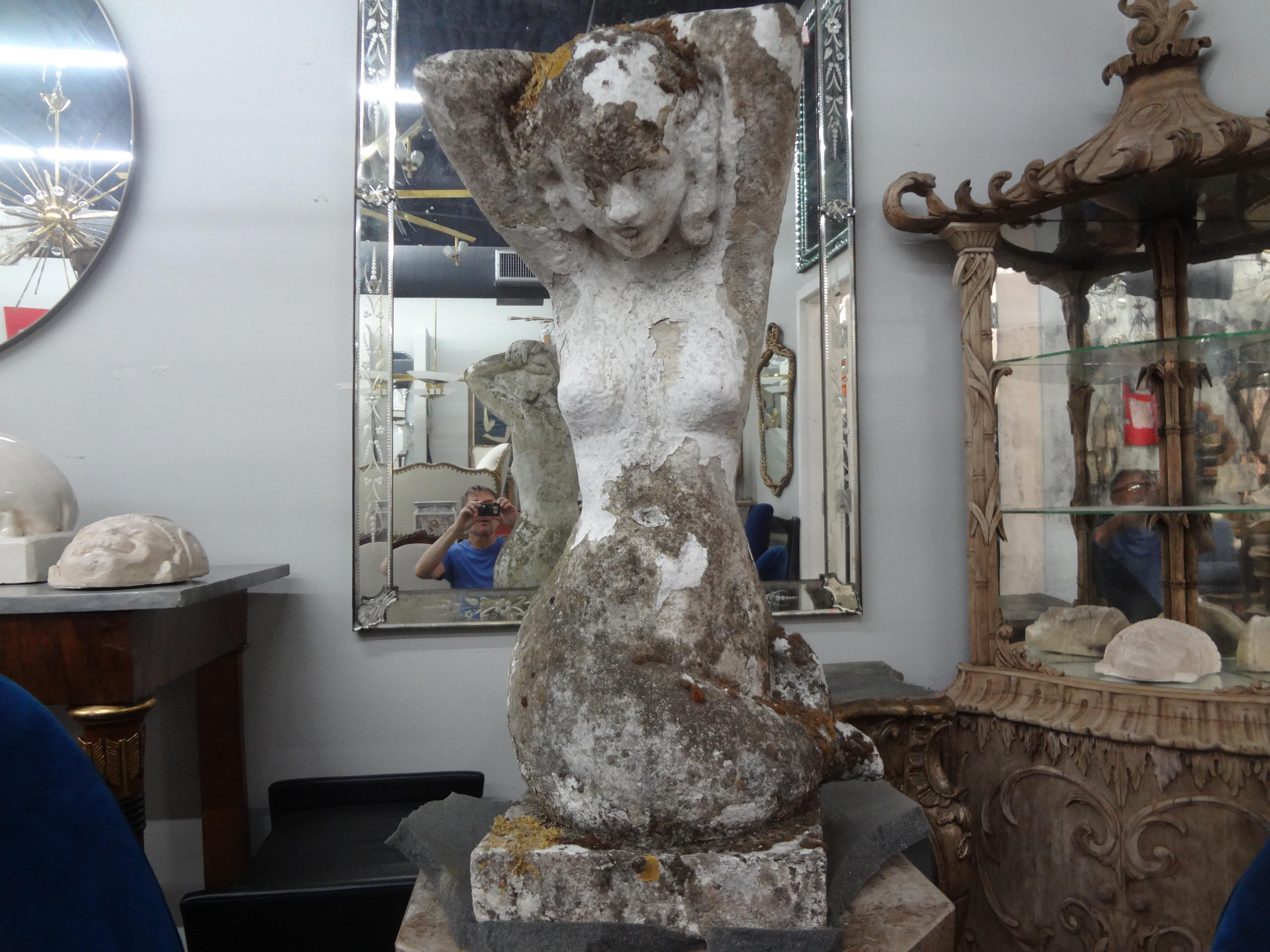 French Garden Statue Of A Mermaid.
This stunning French mermaid garden statue or garden ornament is executed in cement with moss and dates to the 1920's.
Beautiful placed on a pedestal, in a garden or a pond.
Quite unusual statement garden piece!