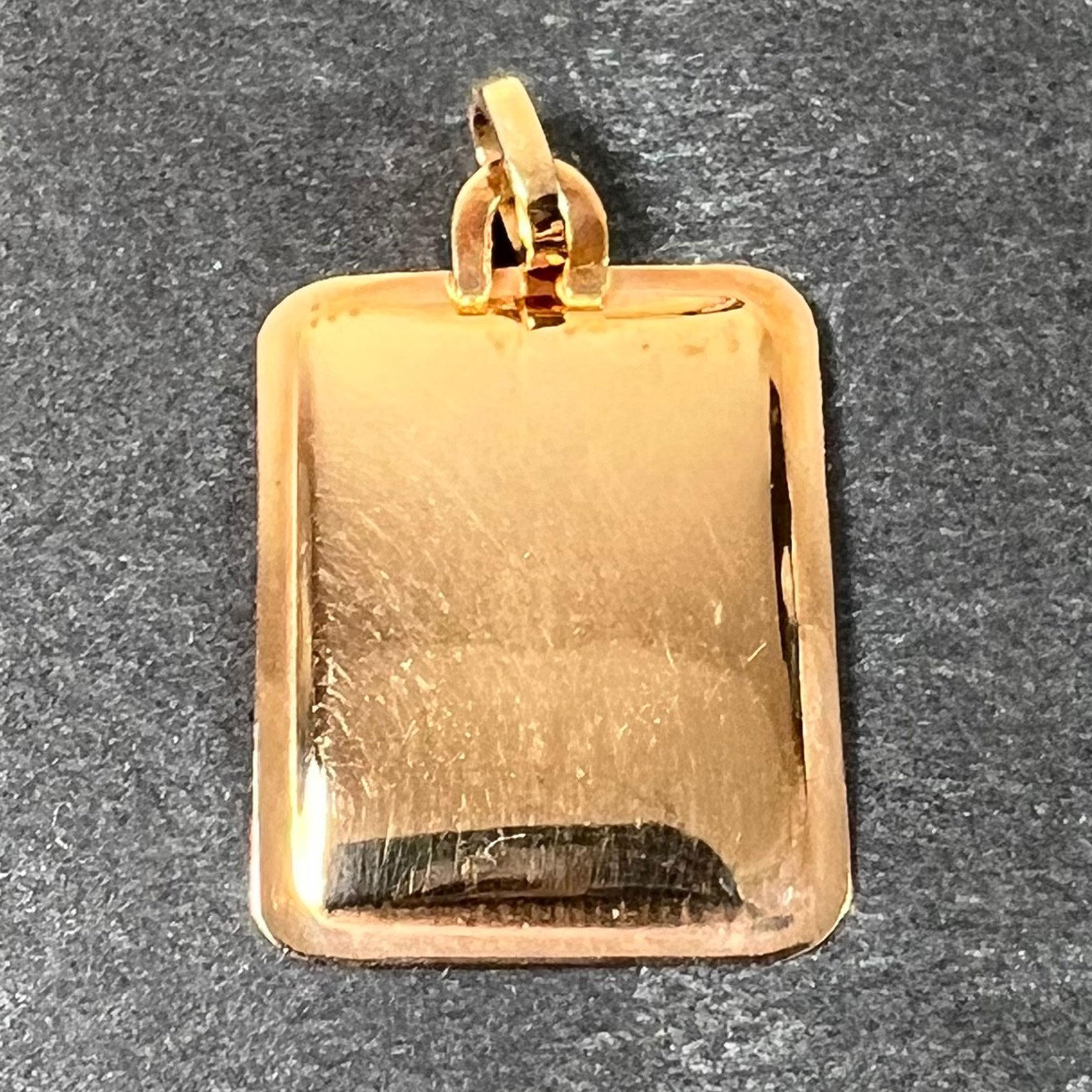 Ciondolo a forma di medaglia con charm in oro giallo 18 carati con segno zodiacale Gemelli francesi In condizioni buone in vendita a London, GB