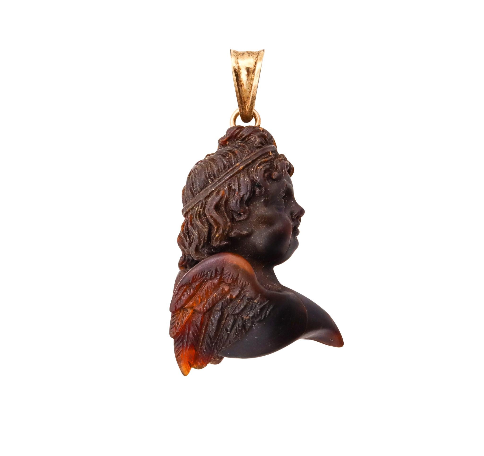 French 18th century carved pendant.

Very rare piece, created in France during the middle Georgian period (1714-1837) circa 1790. The gorgeous carved piece, depicts the profile of a winged cherub facing to the right, with little wings. It was