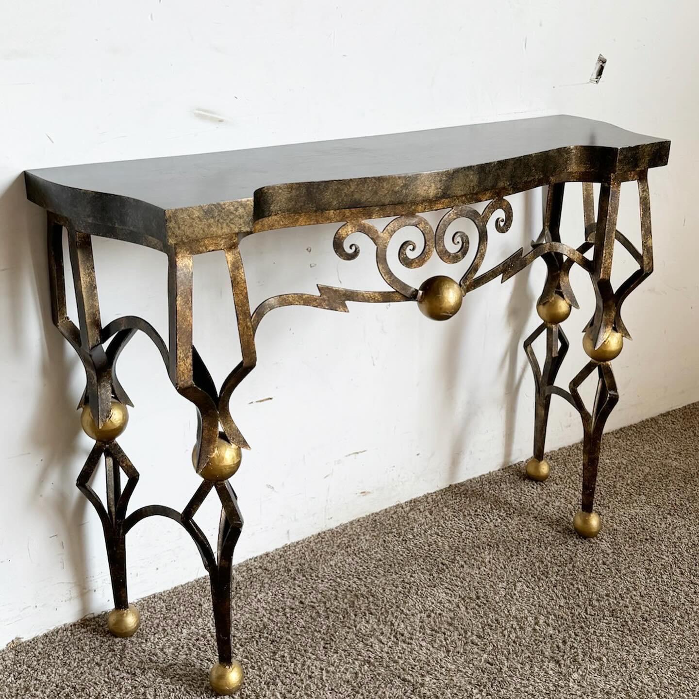 The French Gilbert Poillerat Style Wrought Iron Console Table brings classic French elegance to your interior. Inspired by Gilbert Poillerat's intricate design, it features a skillfully crafted wrought iron base with graceful curves. The ornate yet