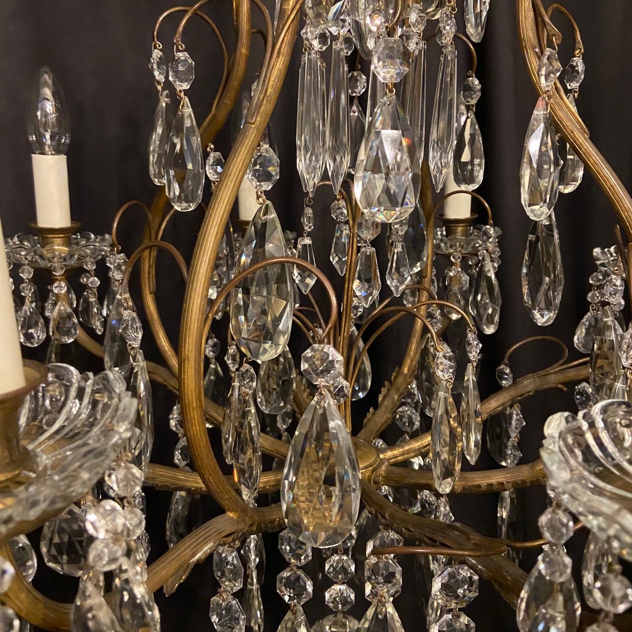 20th Century French Gilded Brass and Crystal 9-Light Antique Chandelier For Sale