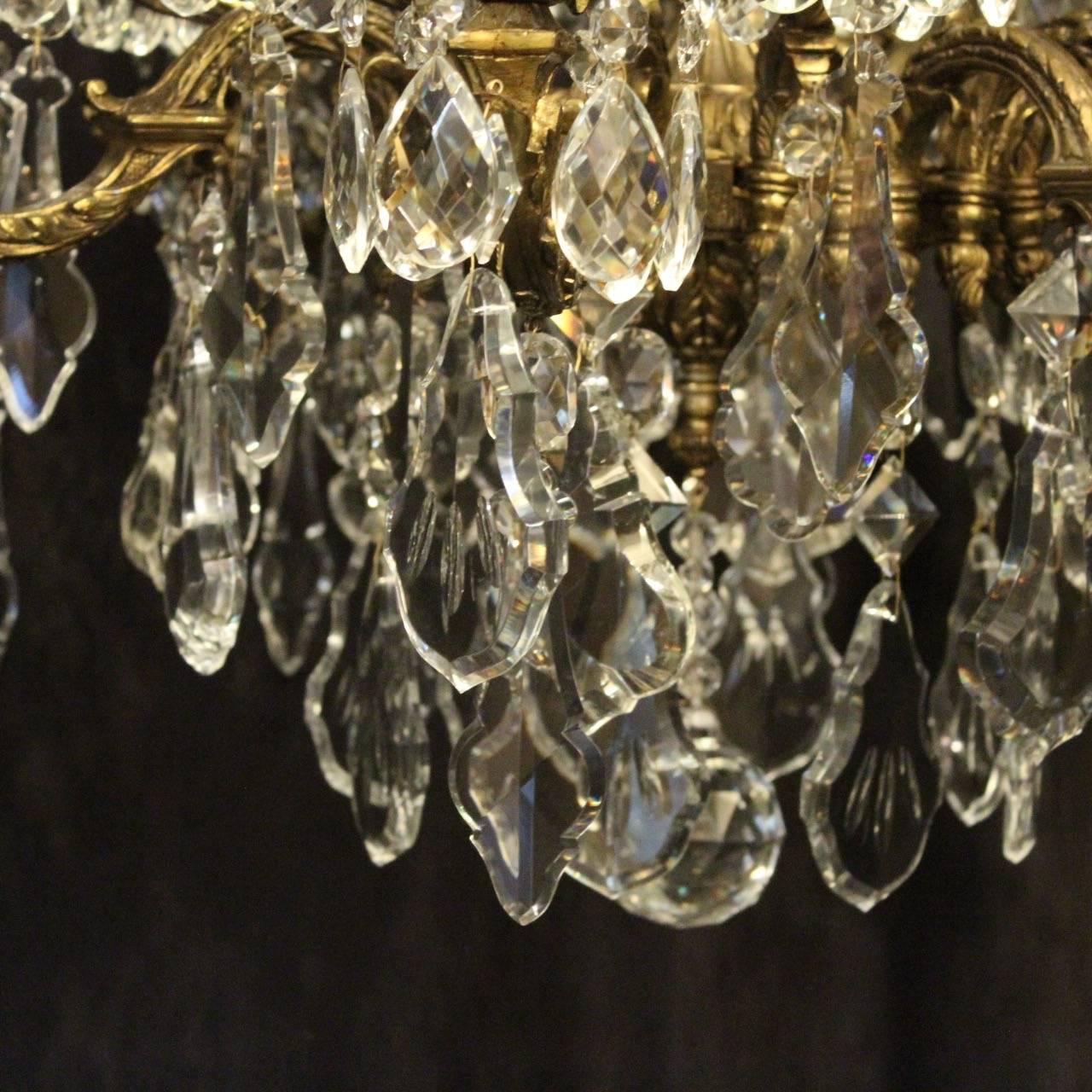 Gilt French Gilded Bronze and Crystal Sixteen-Light Antique Chandelier For Sale