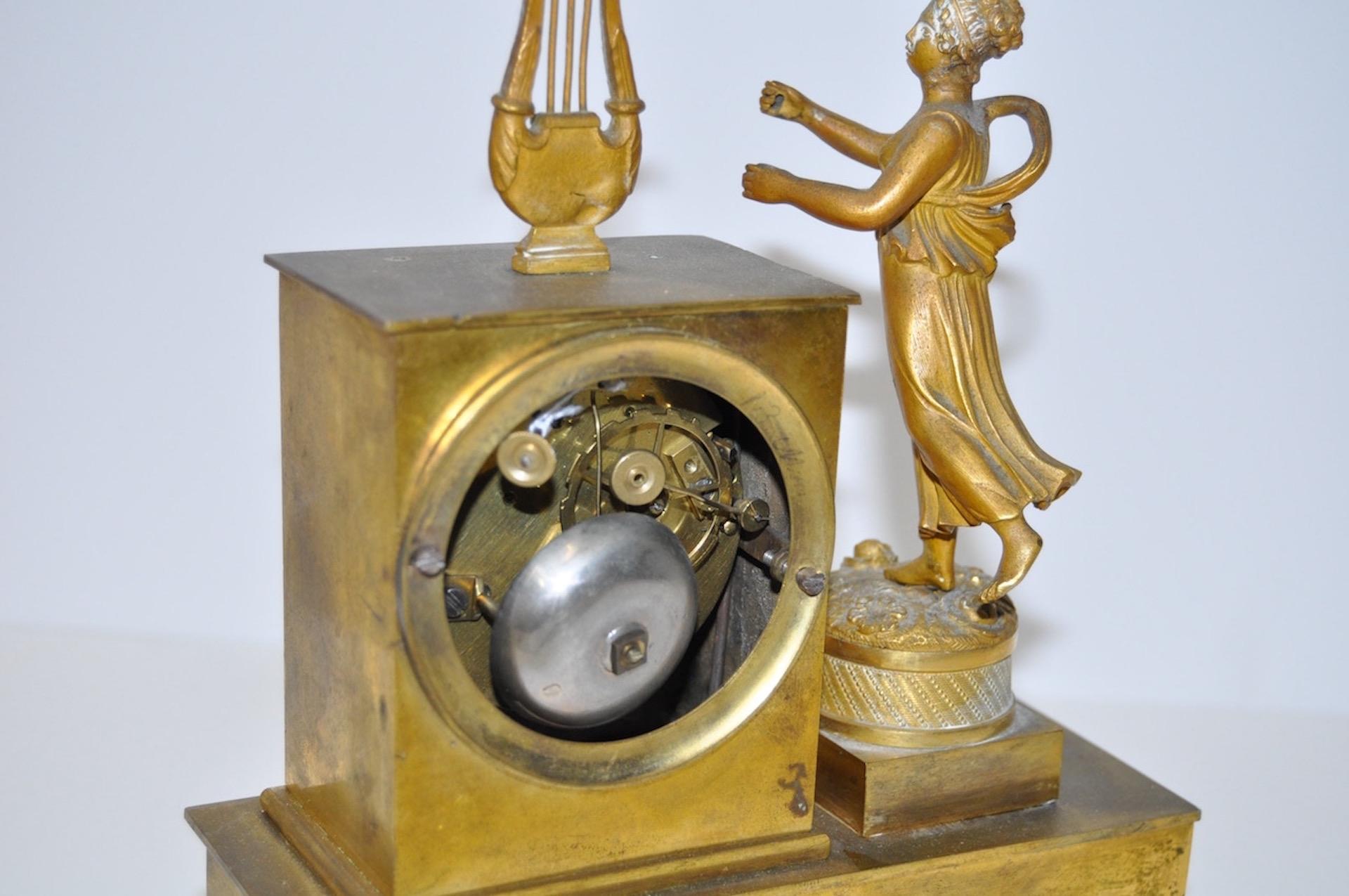 French Gilded Bronze Mantle Clock with Standing Figure, circa 1840s In Fair Condition In San Francisco, CA