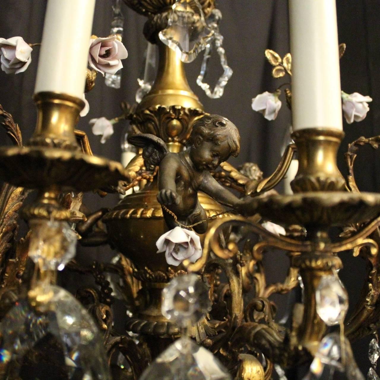 Gilt French Gilded Cherub Bronze & Crystal Twelve-Light Antique Chandelier For Sale