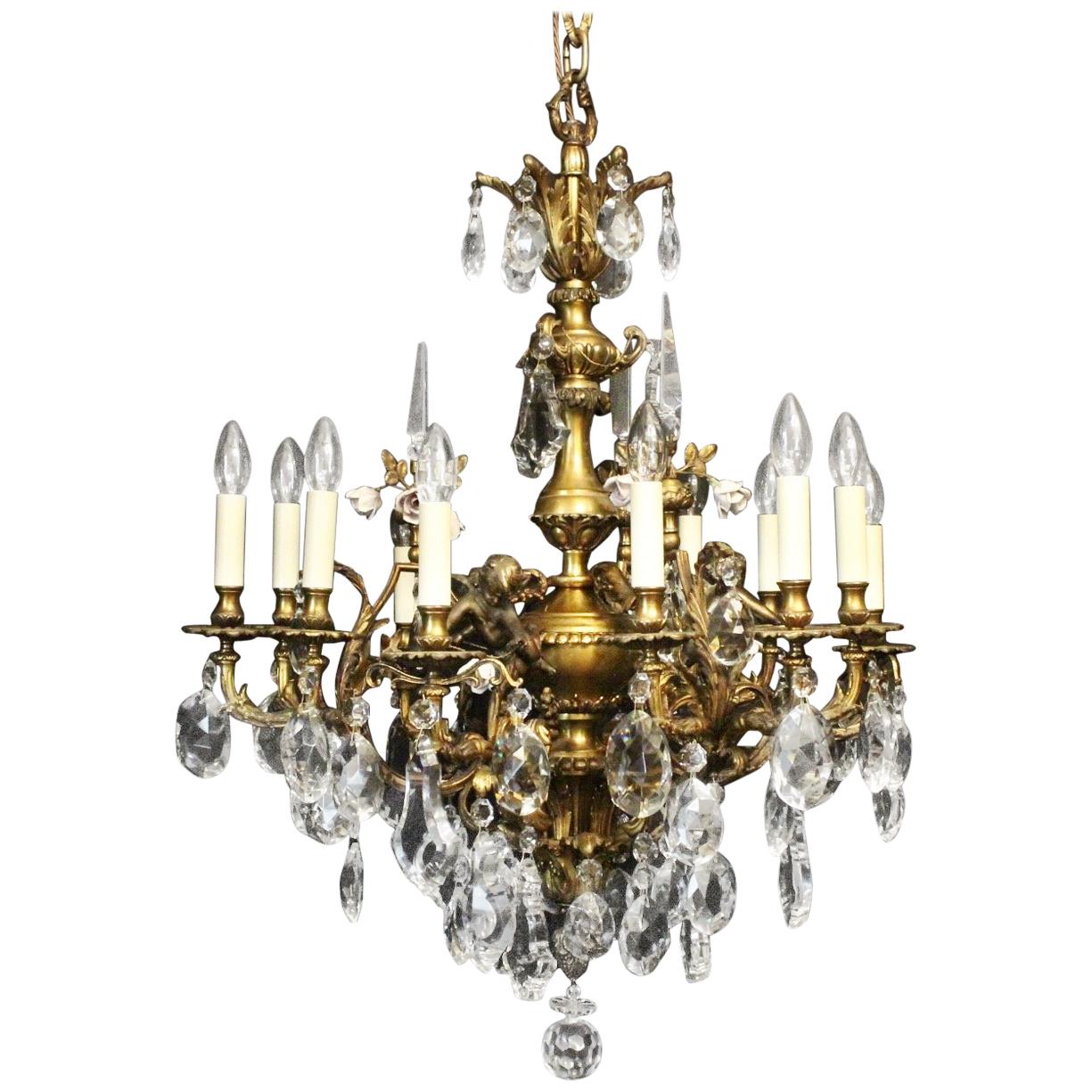 French Gilded Cherub Bronze & Crystal Twelve-Light Antique Chandelier For Sale