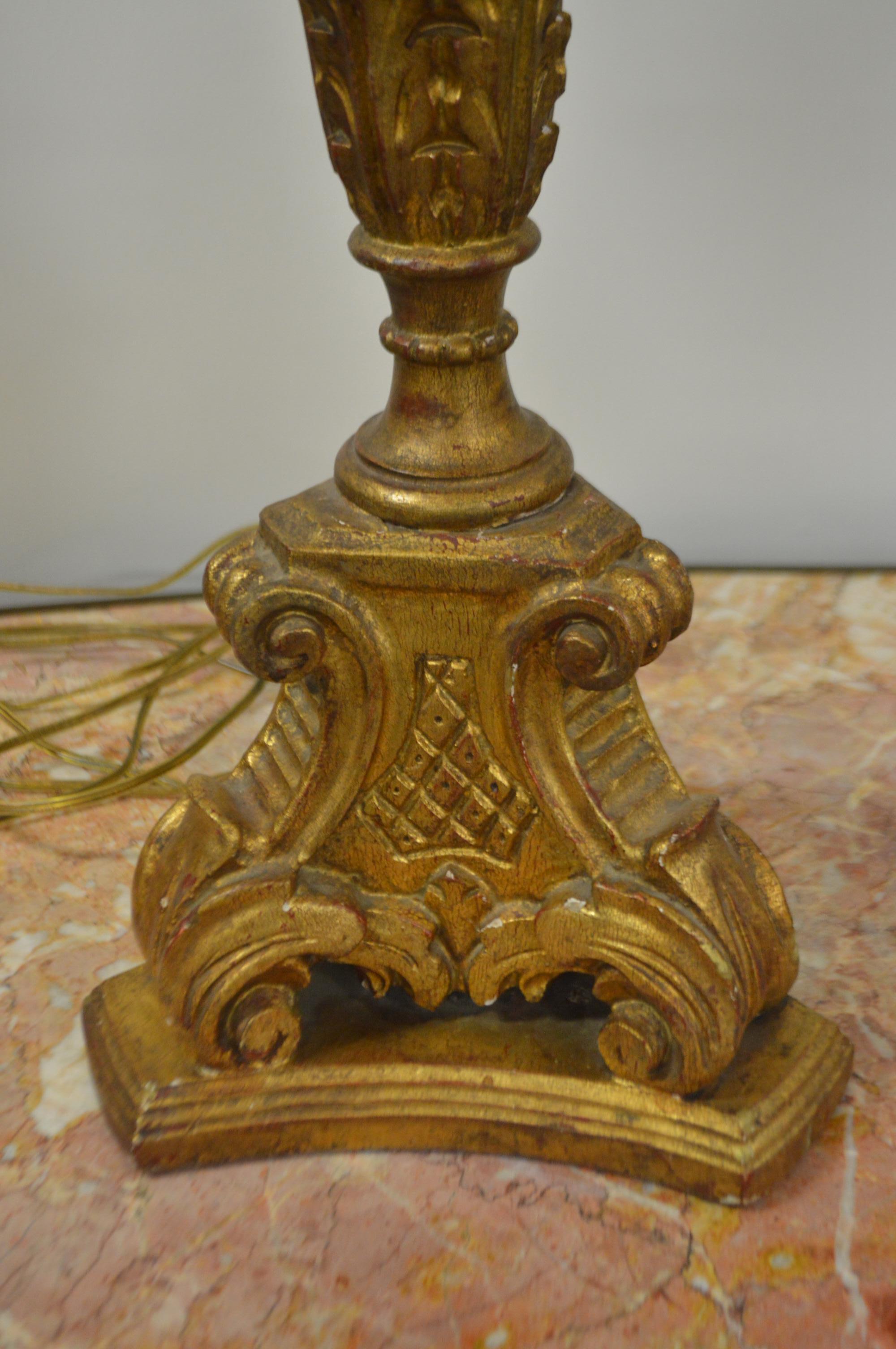 Gilt French Gilded Hand Carved Wooden Church Candelabra Converted in a Table Lamp For Sale