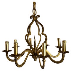 French gilded iron chandelier manner of maison ramsay
