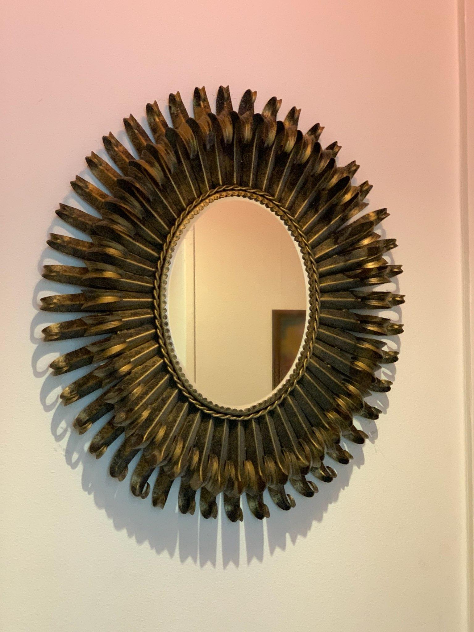 French gilded starburst iron mirror, mid-1900s.  In Good Condition For Sale In Stockholm, SE