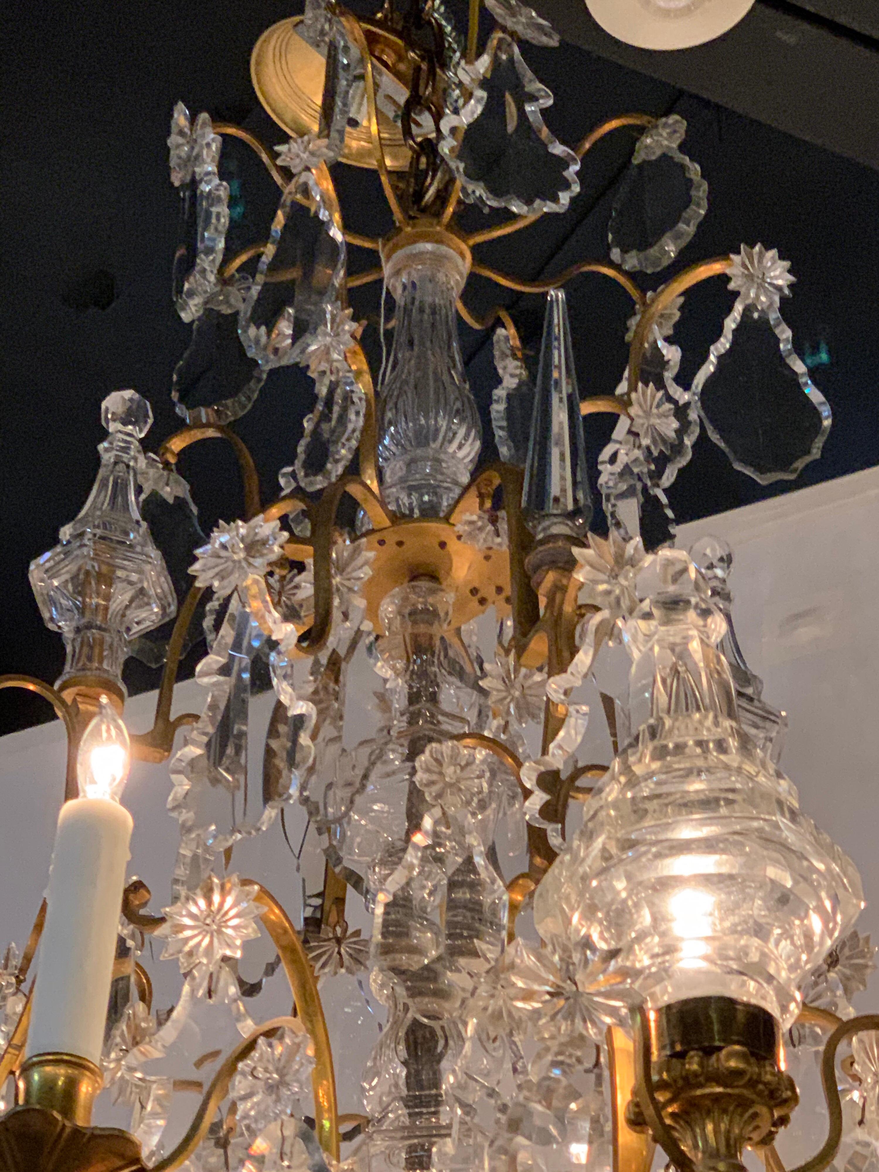 20th Century French Gilt and Bronze Crystal 11-Light Chandelier For Sale