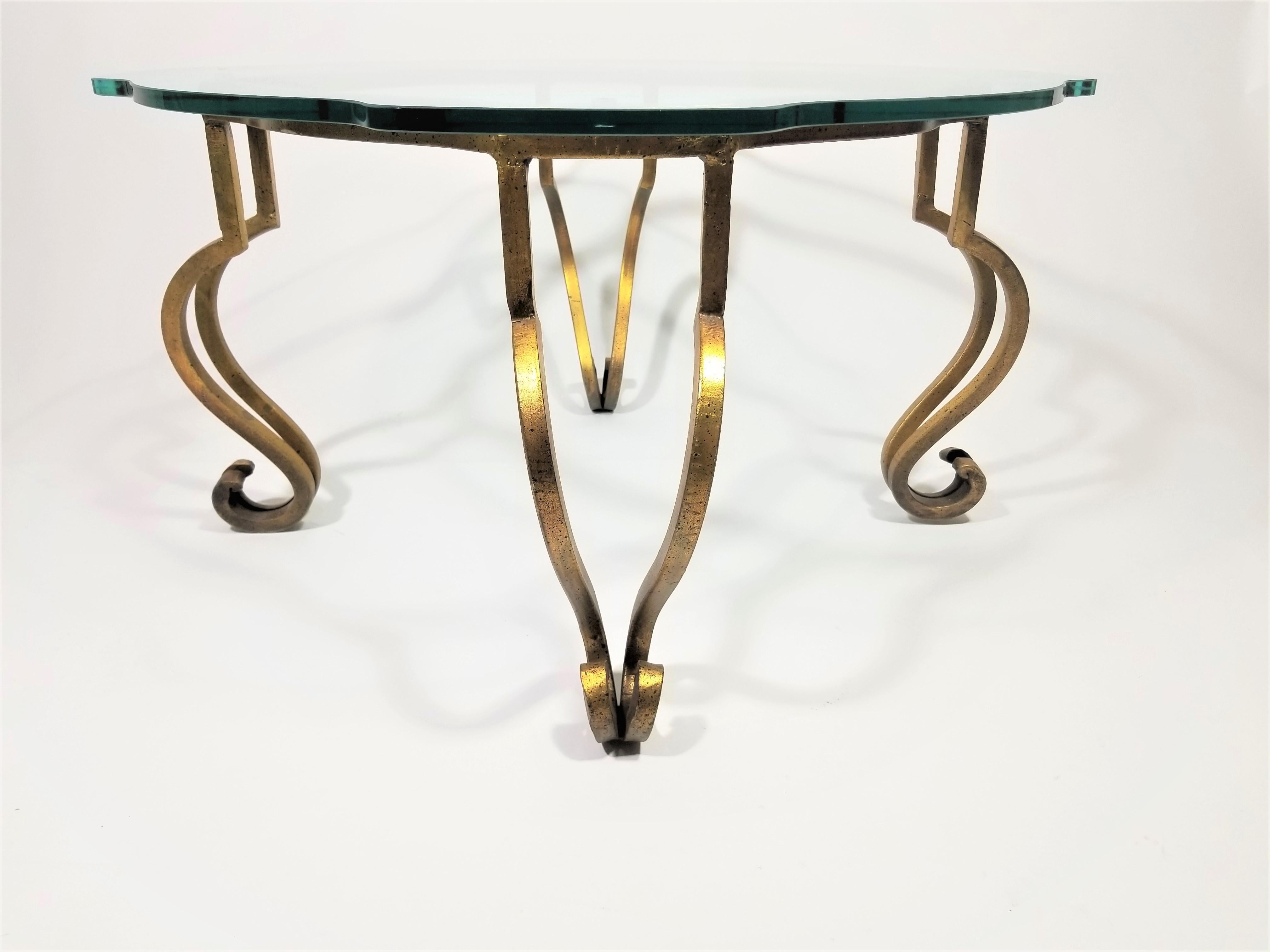 Mid Century French Coffee or Cocktail Table. Gilded Iron base with Glass Top. Custom shaped glass is 1/2