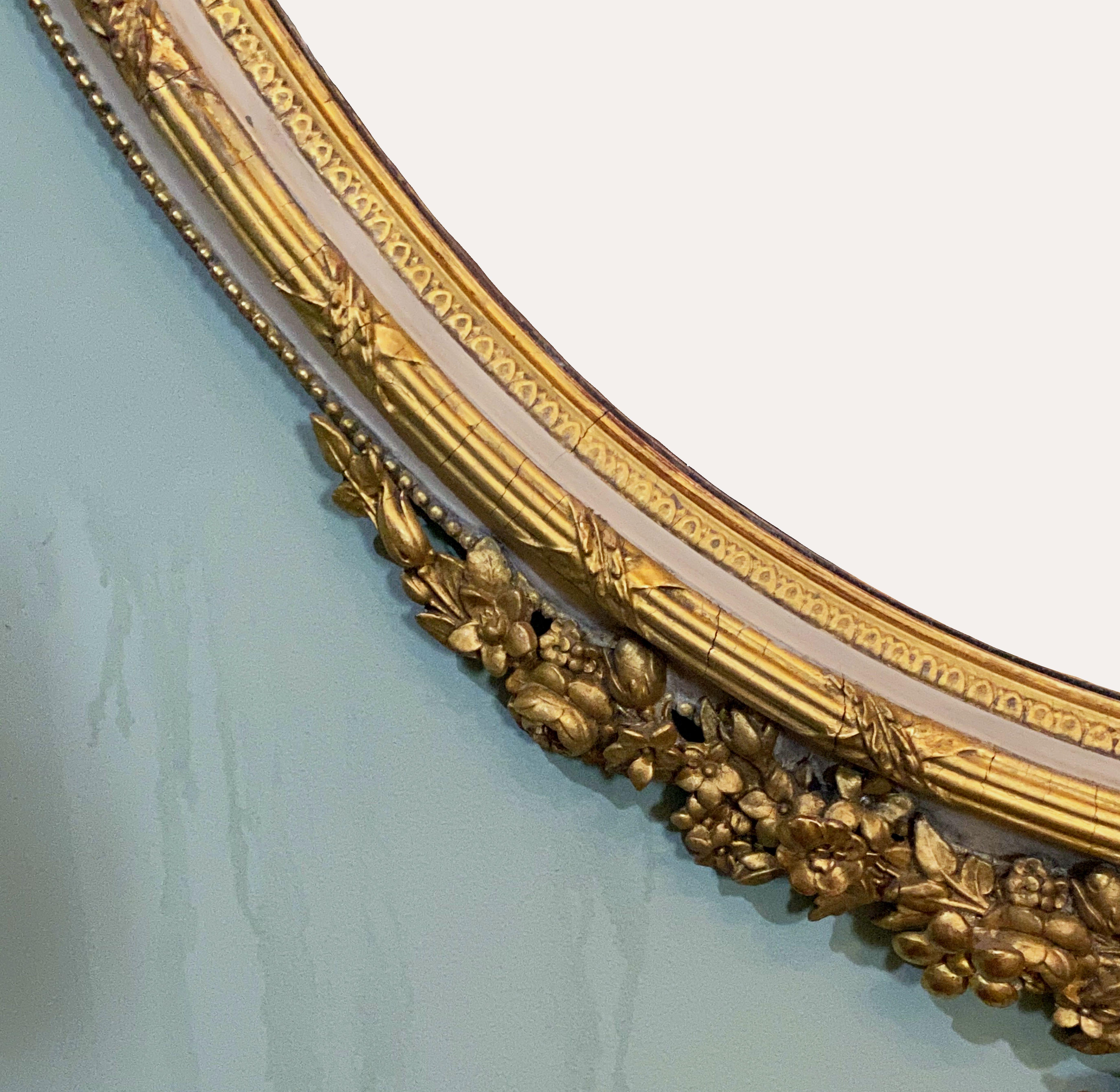 French Gilt and Parcel Cream Oval Wall Mirror with Ribbon Tied Crest and Frieze  4