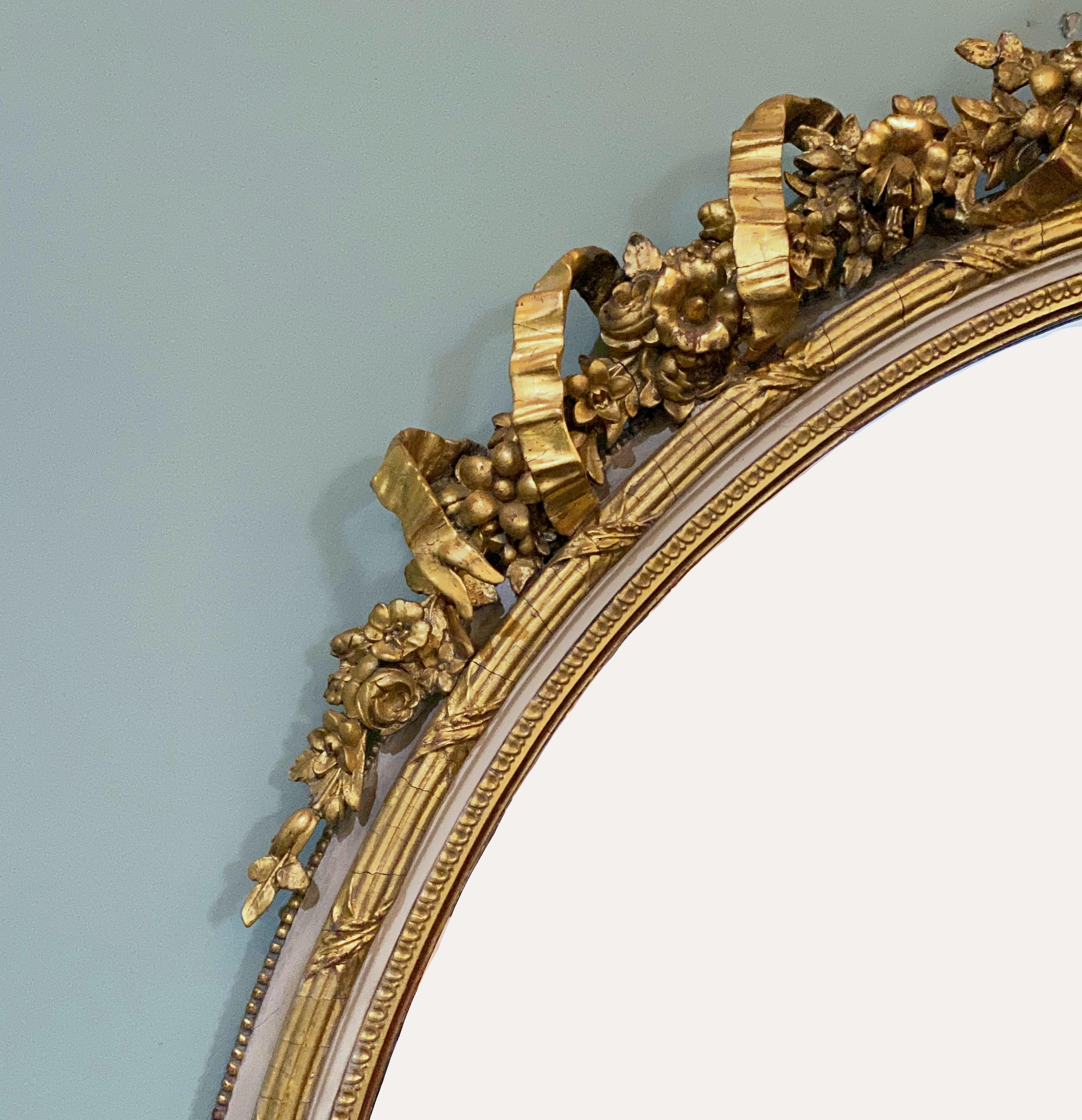 French Gilt and Parcel Cream Oval Wall Mirror with Ribbon Tied Crest and Frieze  6