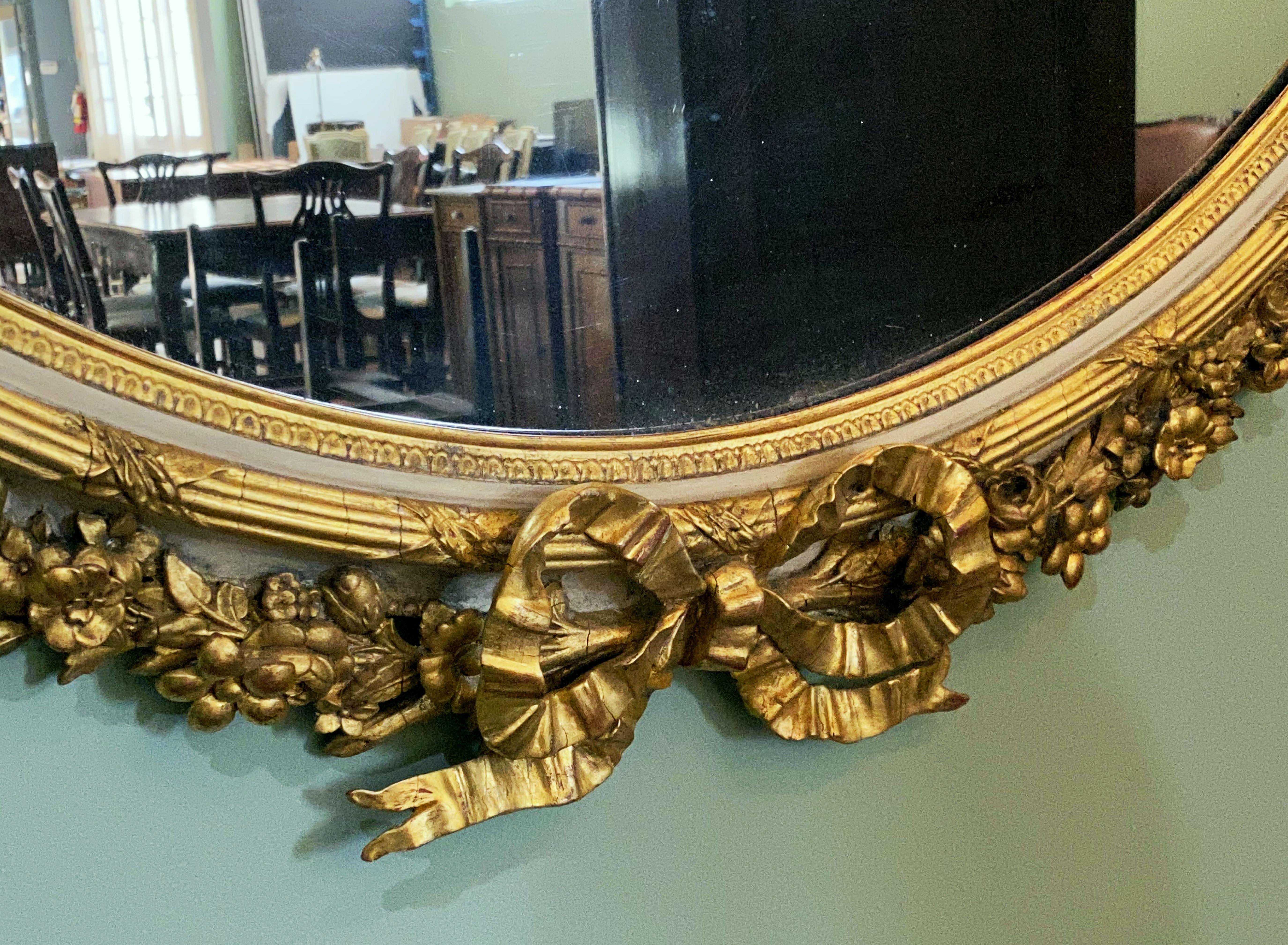 French Gilt and Parcel Cream Oval Wall Mirror with Ribbon Tied Crest and Frieze  11