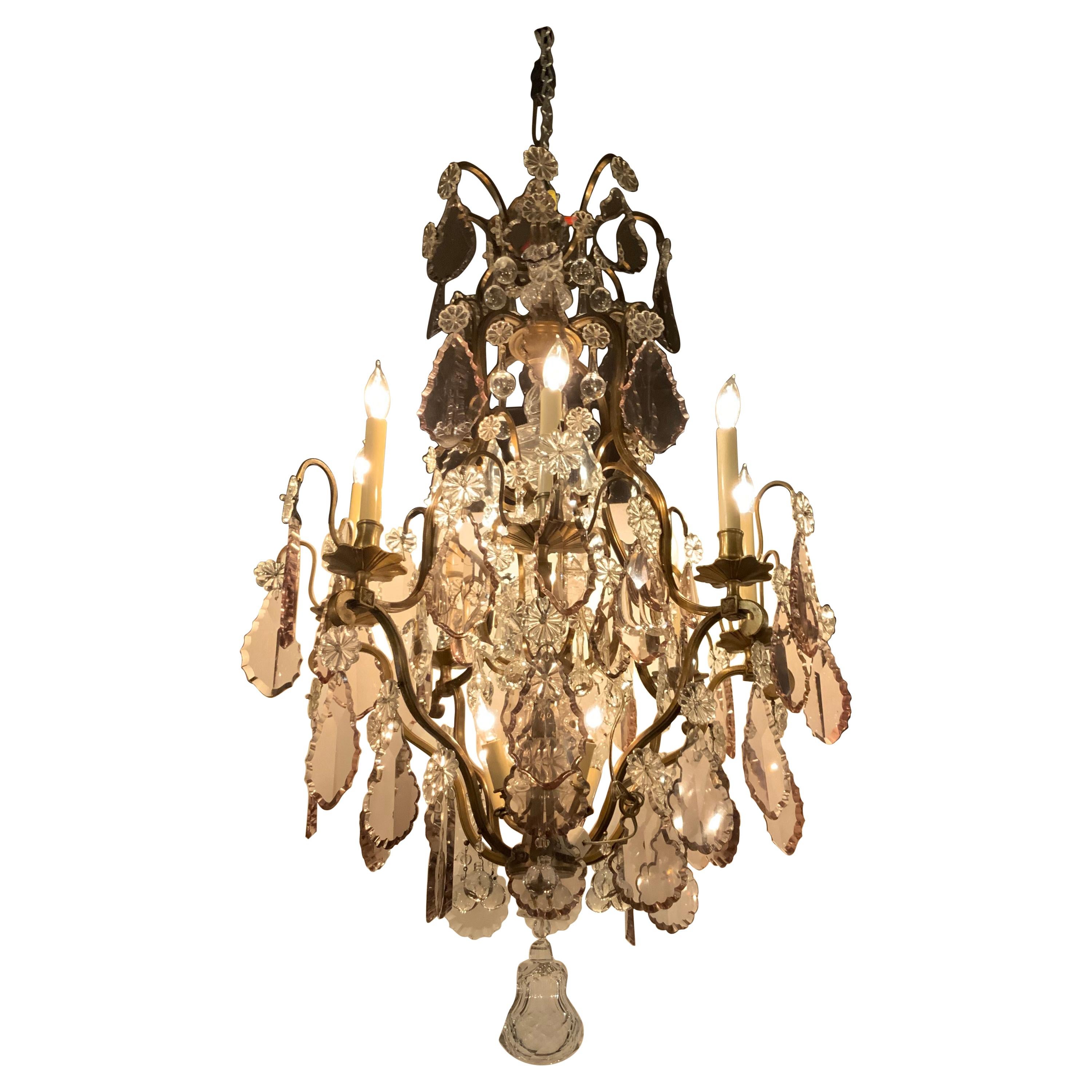 French Gilt Bronze and Crystal 12 Light Chandelier with Central Post in Crystal For Sale