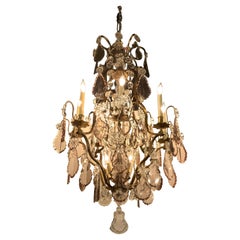 French Gilt Bronze and Crystal 12 Light Chandelier with Central Post in Crystal