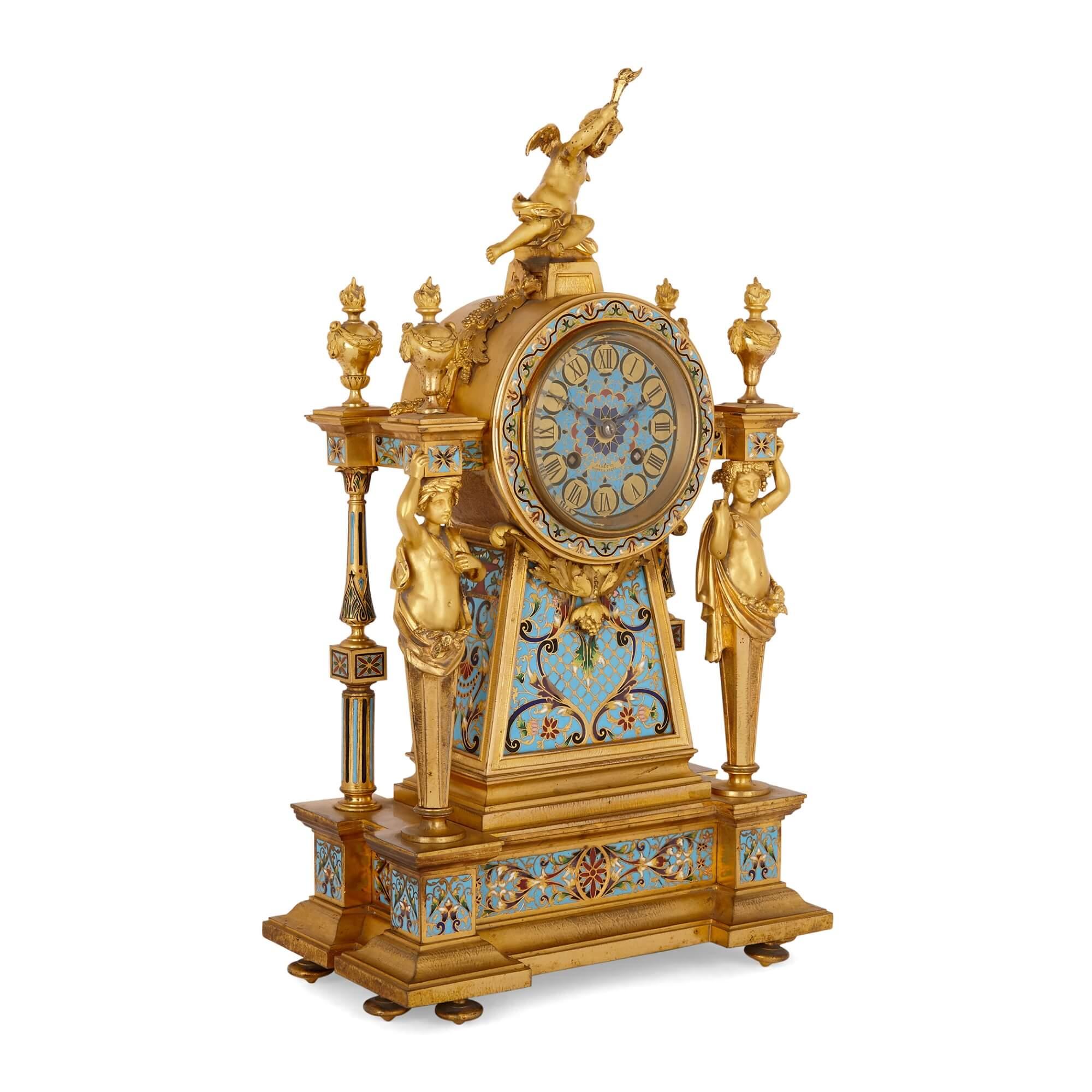 French gilt bronze and enamel three-piece clock set
French, late 19th Century
Clock: Height 45cm, width 26cm, depth 14.5cm
Candelabra: Height 31.5cm, width 21cm, depth 9cm

This charming clock set is a beautiful piece of late nineteenth-century