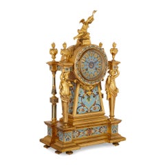 French gilt bronze and enamel three-piece clock set