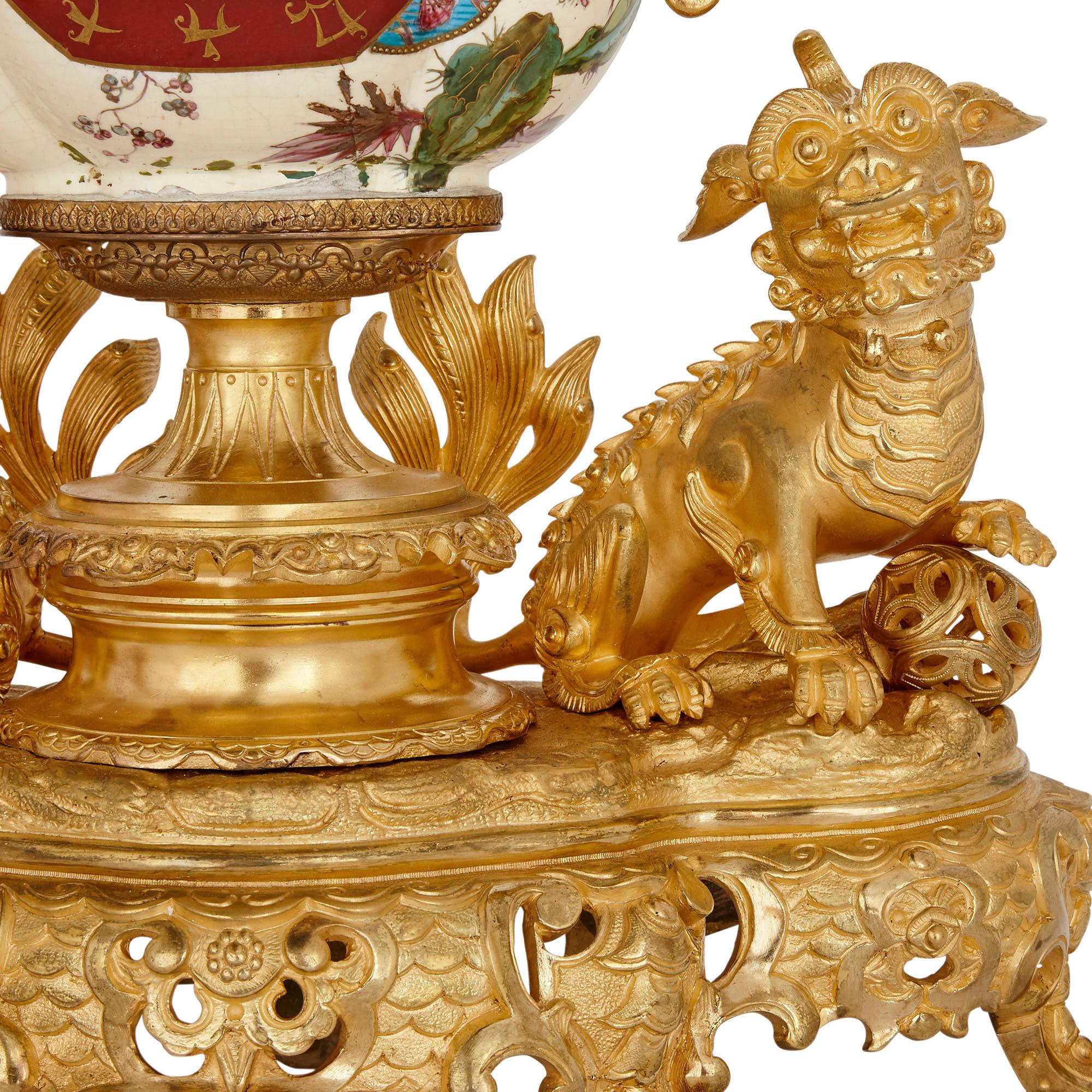 19th Century French Gilt Bronze and Faience Clock Set in the Chinoiserie Style For Sale