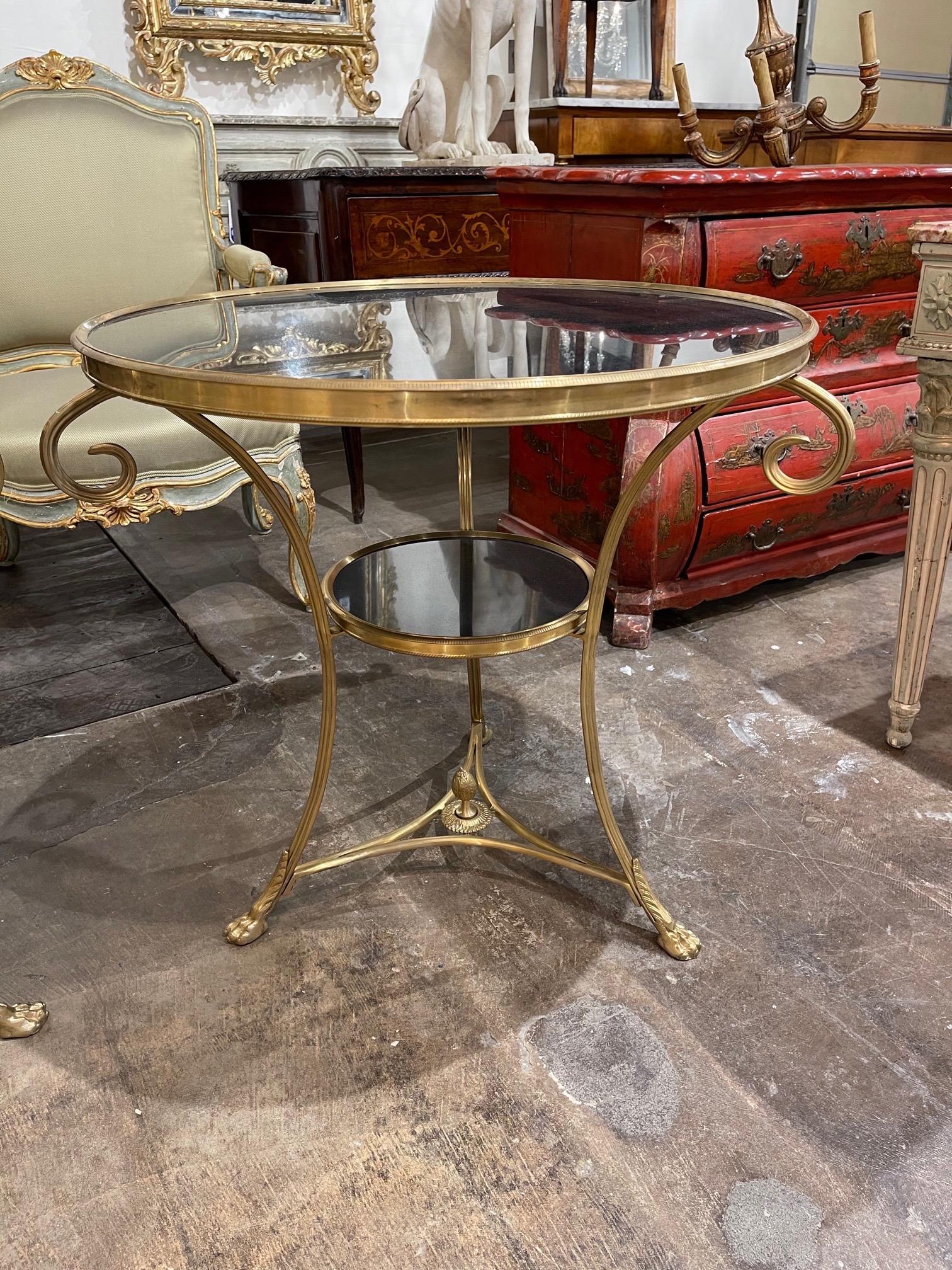 Elegant French gilt bronze and black granite Gueridon tables. Very fine quality on these. Makes an impressive statement! Note: Price listed is per item.