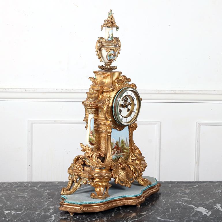 A lovely French, ormolu mantle clock with stunning Sevres porcelain panels, circa the late 1800s.
Dimensions:
W: 17″
D: 8″
H: 23.5″