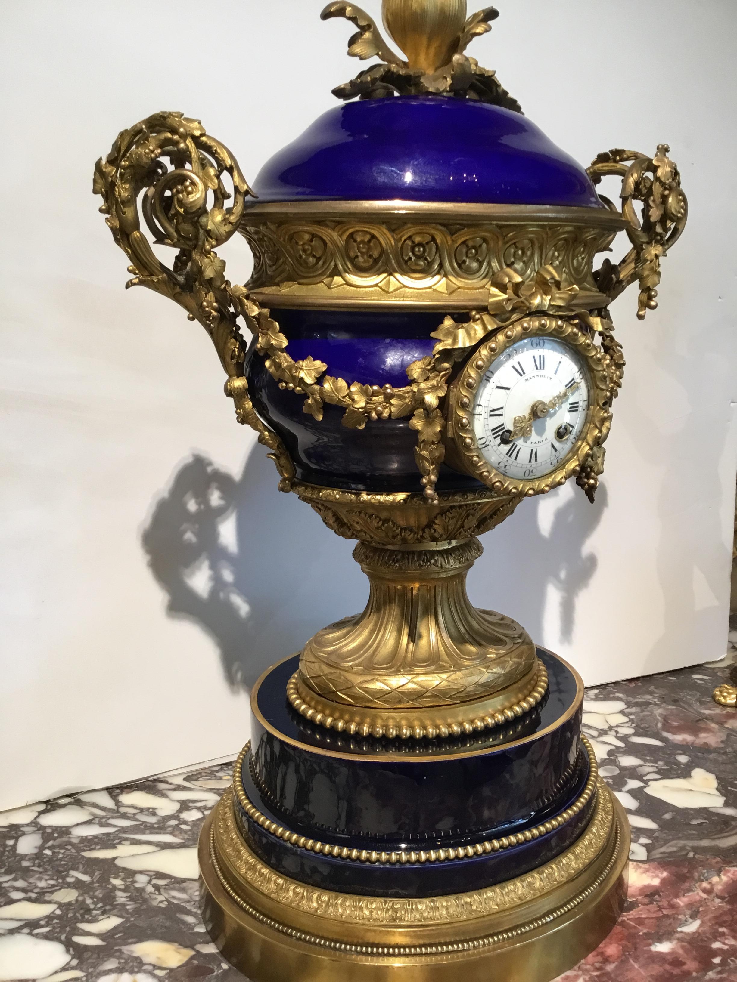 French Gilt Bronze and Porcelain XVI Urn Form Large Clock, circa 1880 In Good Condition For Sale In Houston, TX
