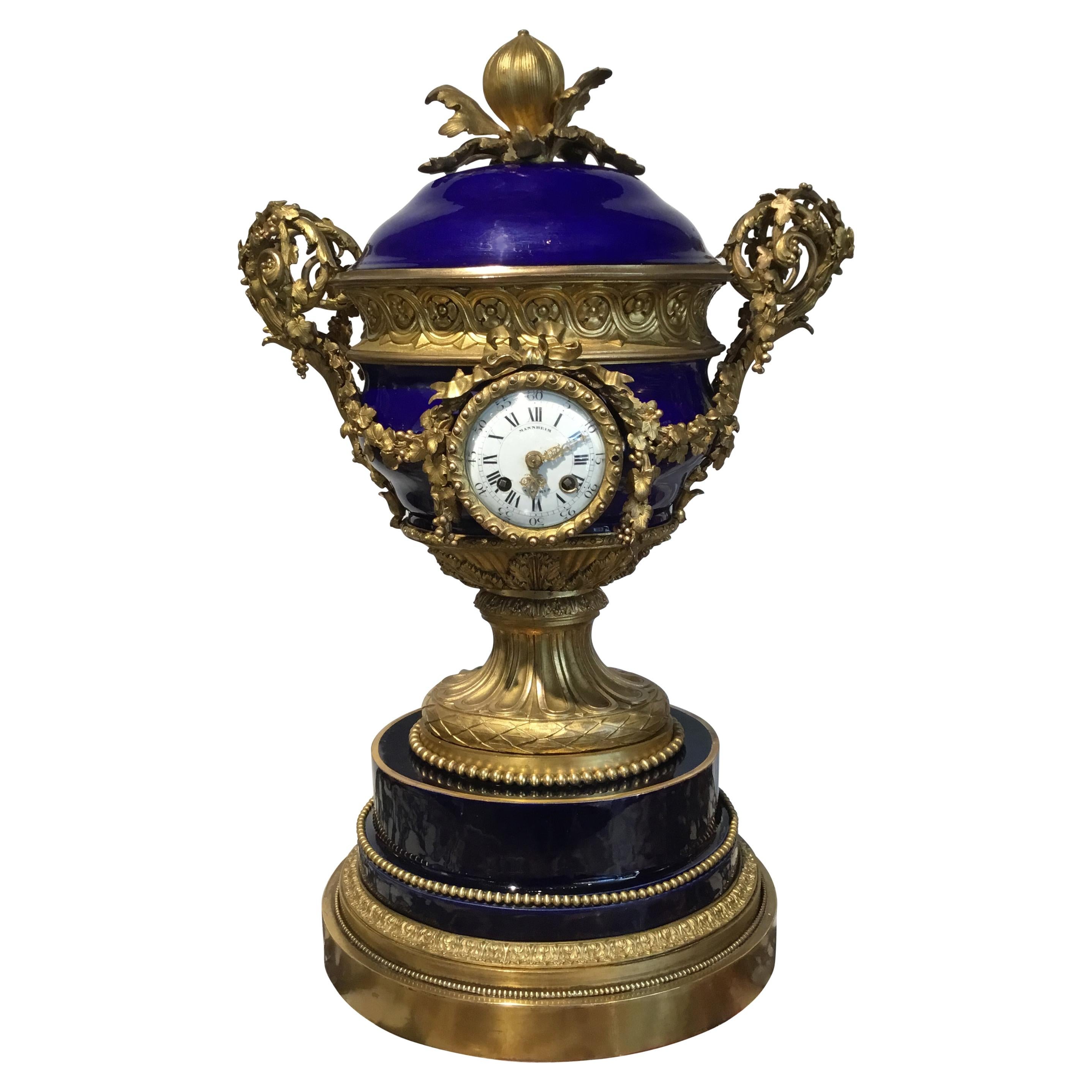 French Gilt Bronze and Porcelain XVI Urn Form Large Clock, circa 1880