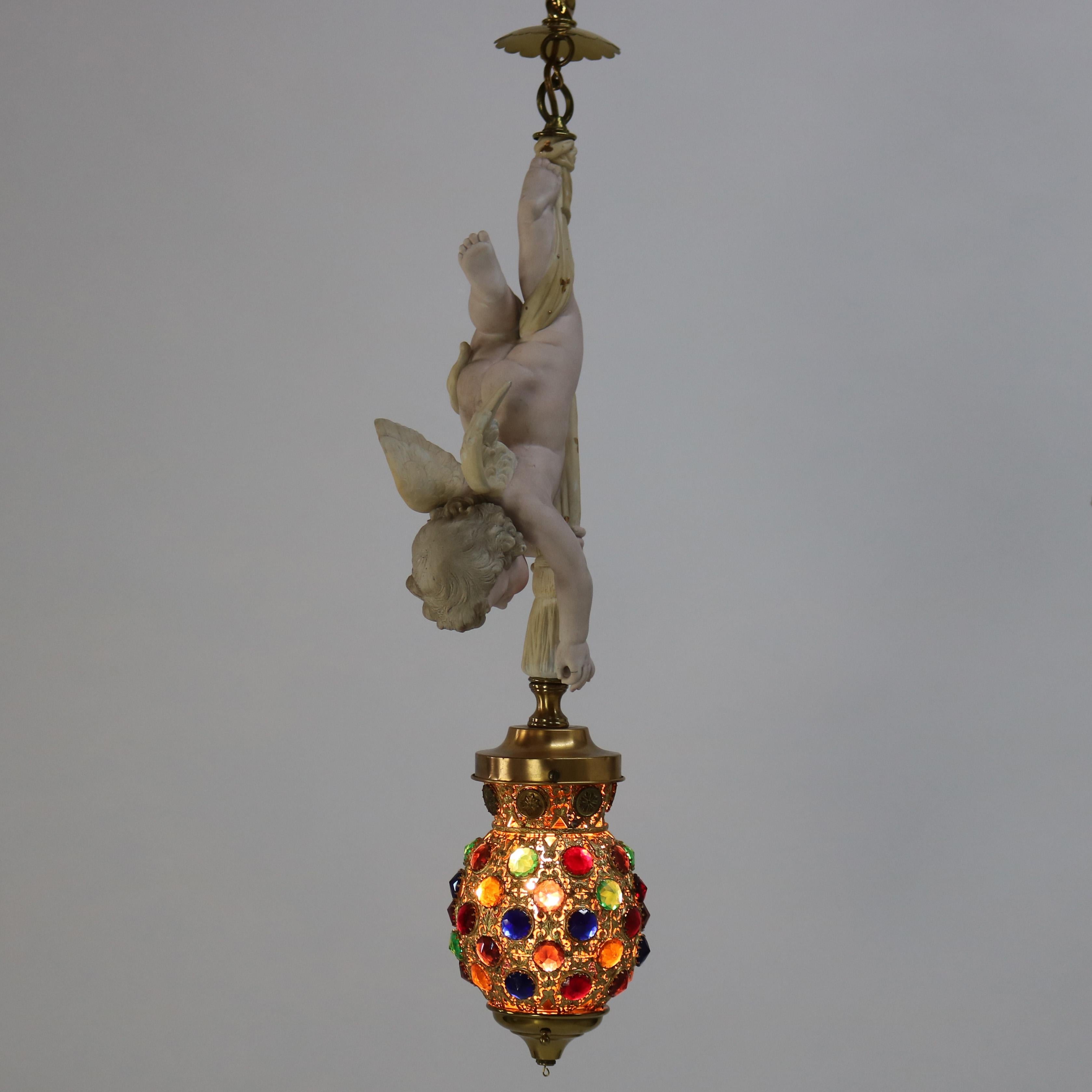 Antique French Gilt Bronze, Brass & Bisque Figural Cupid Pendant Light & Jeweled Shade c1920

Medidas - 34 1/4