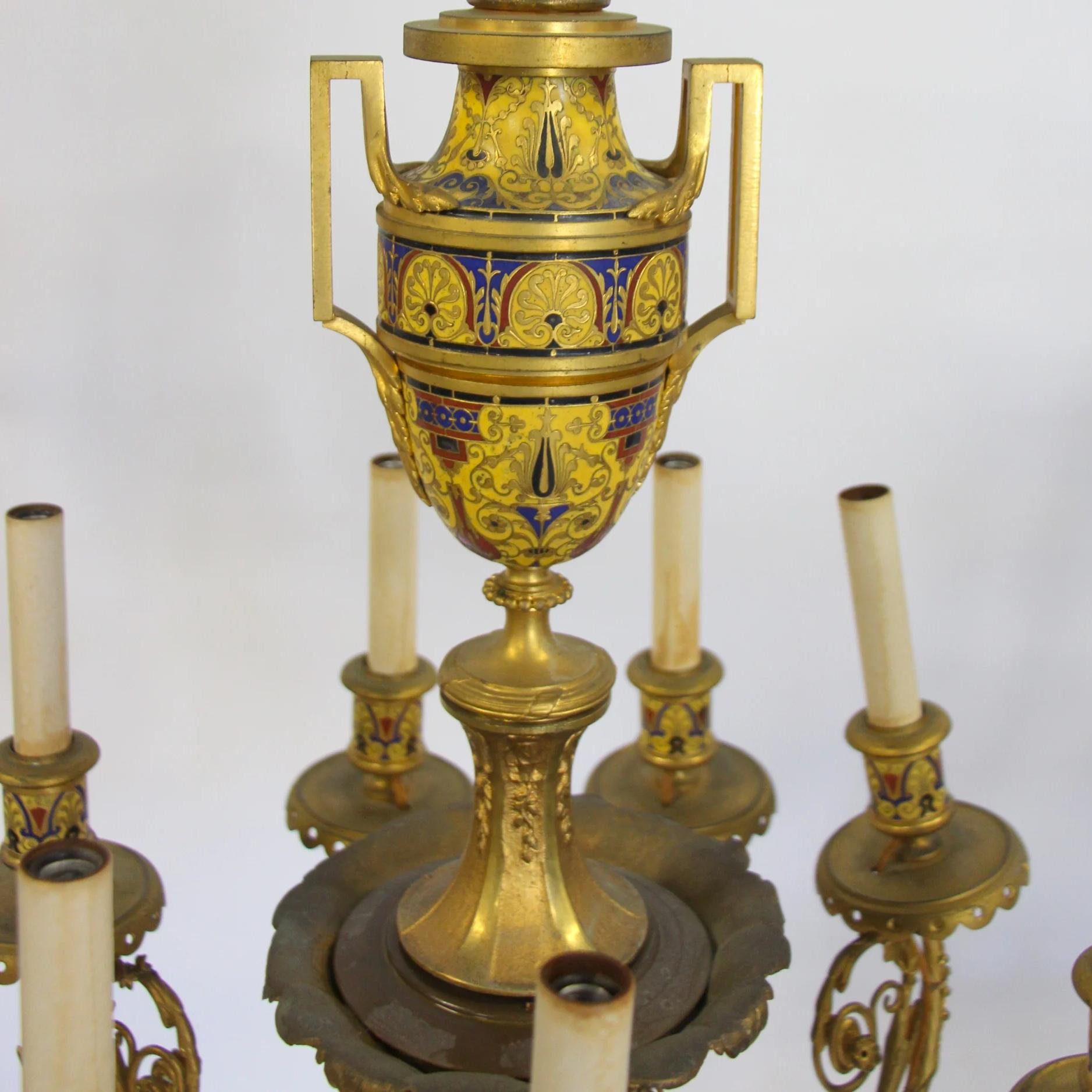 A fine quality French gilt-bronze champlevé enamel nine-light chandelier attributed to Barbedienne

Maker: Attributed to Ferdinand Barbedienne (1810-1892)
Date: 19th century
Origin: French
Dimension: 25 x 21 inches.

 