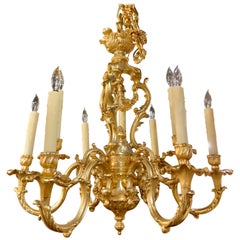 Vintage French Gilt bronze chandelier in the Louis XV taste, nine light with floral swag