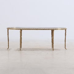 French gilt bronze coffee table attributed to Maison Bagues C 1945.