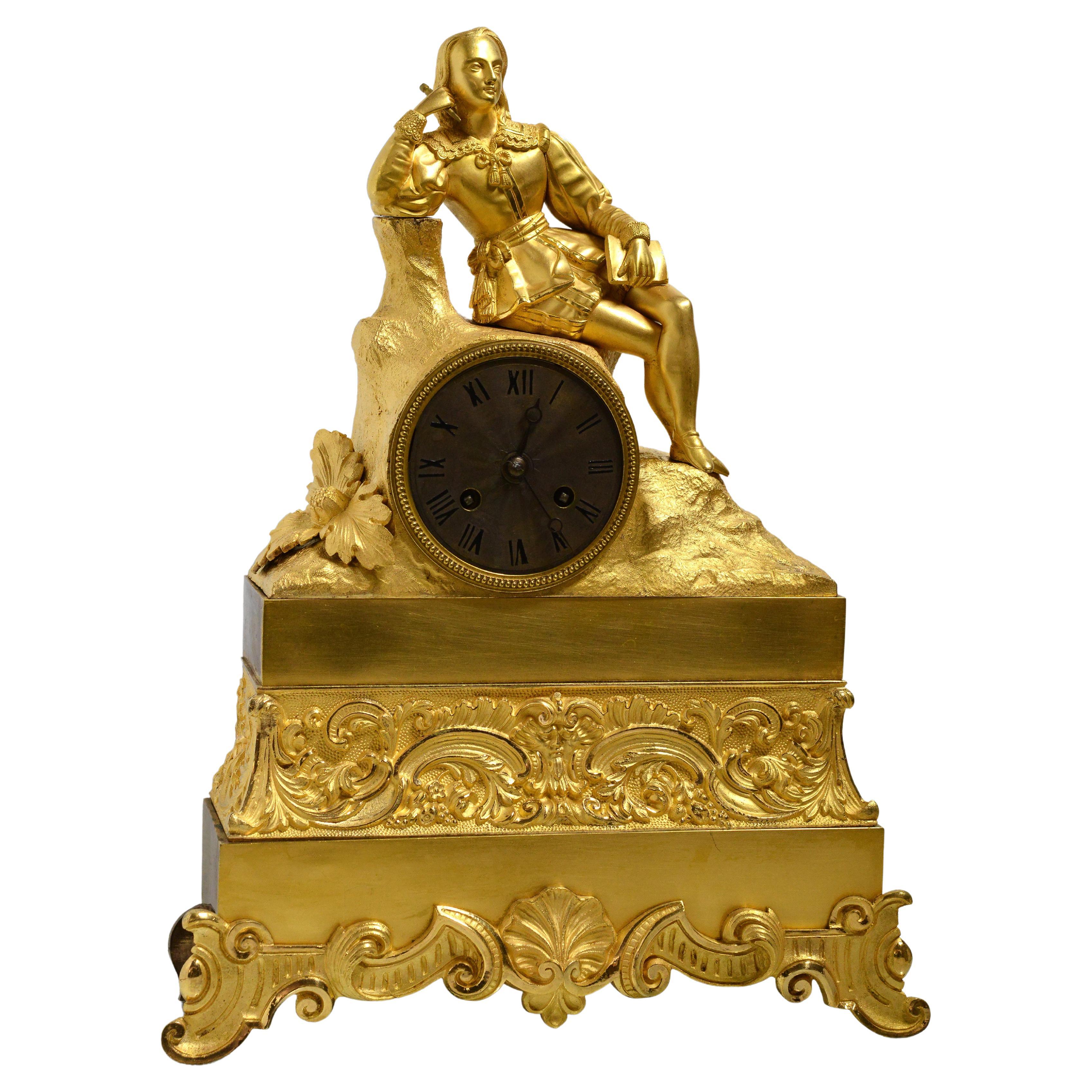 Horloge ancienne figurative en bronze doré avec poète de la Renaissance début 19ème siècle
