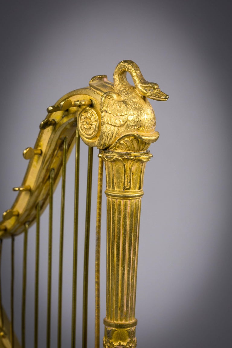 French gilt bronze harp, 19th century. On marble base.