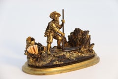 French gilt bronze ink stand depicting a young man harvesting circa 1860