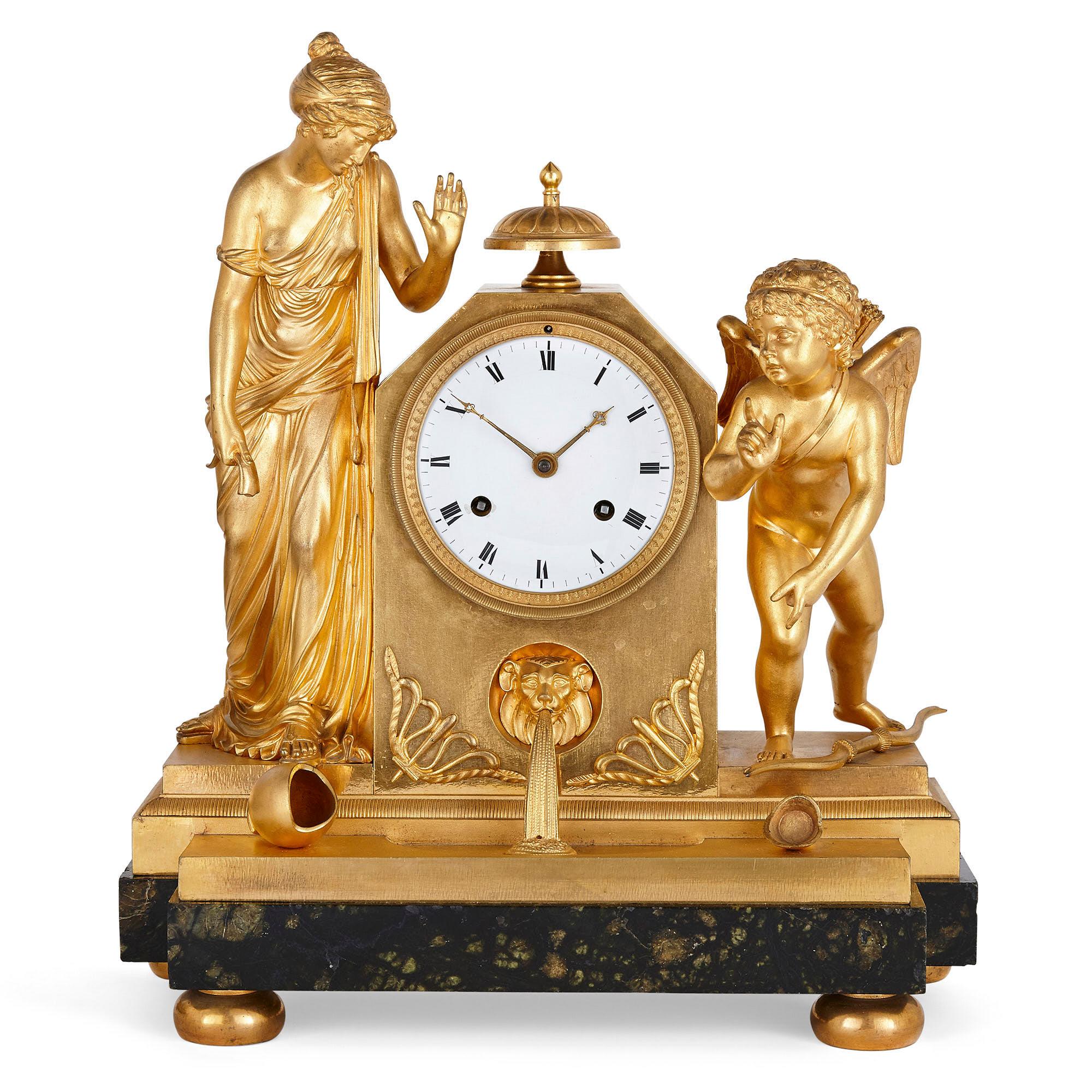 French gilt bronze mantel clock with Classical figures
French, 19th century
Measures: Height 45cm, width 39cm, depth 17cm

This mantel clock features fine gilt bronze Classical style figures either side of the dial, masterfully cast in the