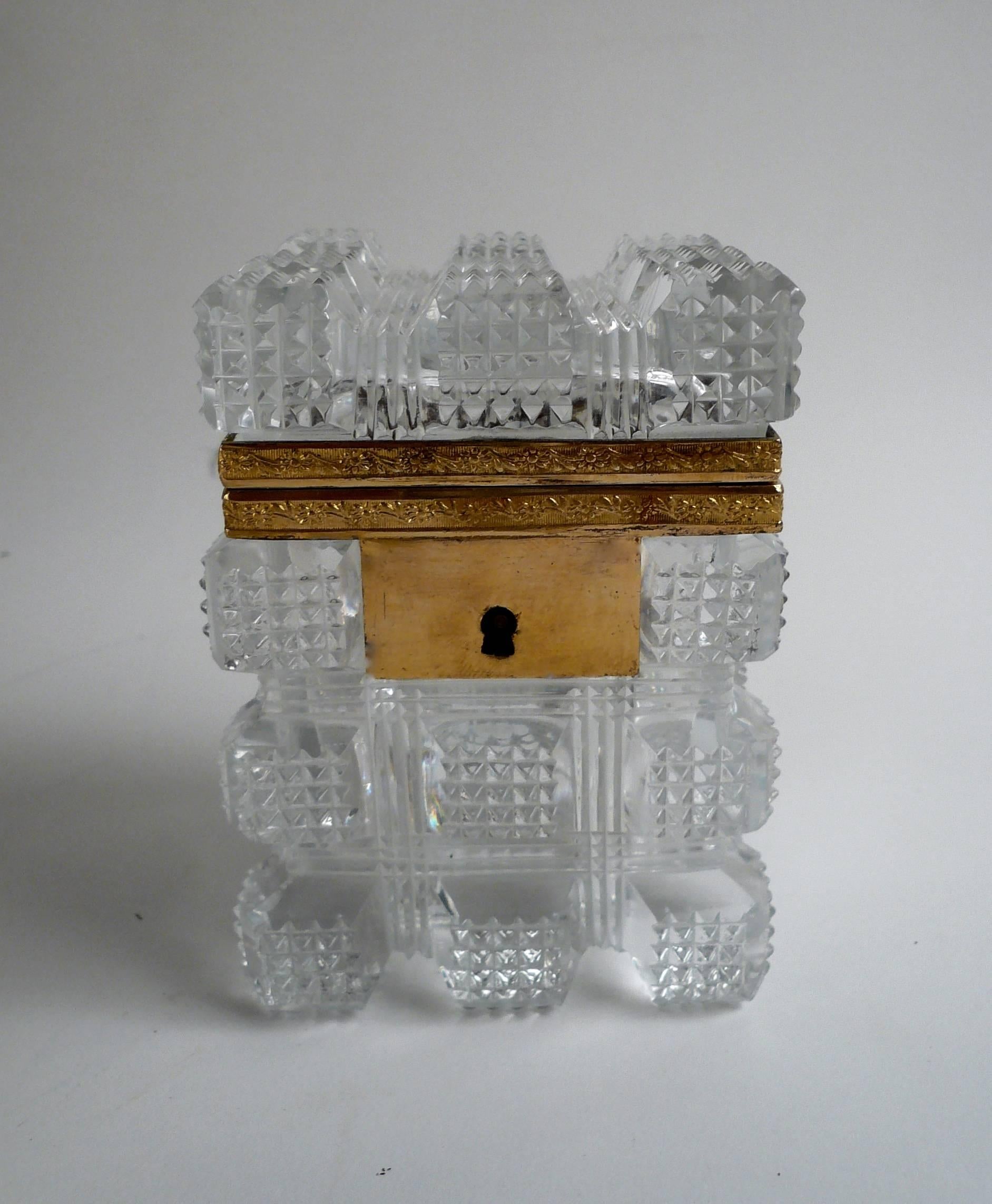 This cut crystal and gilt bronze box is beautifully hand cut, and in excellent condition.