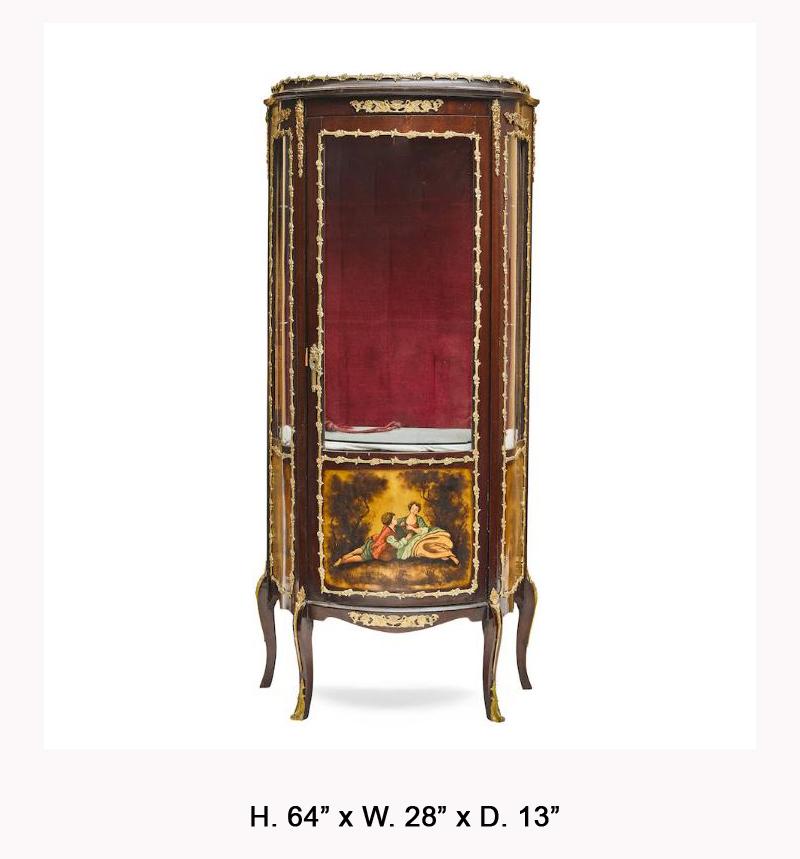 Lovely French Vernis Martin style gilt bronze mounted mahogany vitrine, 20th century.
The mahogany veneered central door revealing a red velvet interior, the door centered with a hand-painted panel depicting a romantic court scene, flanked by two