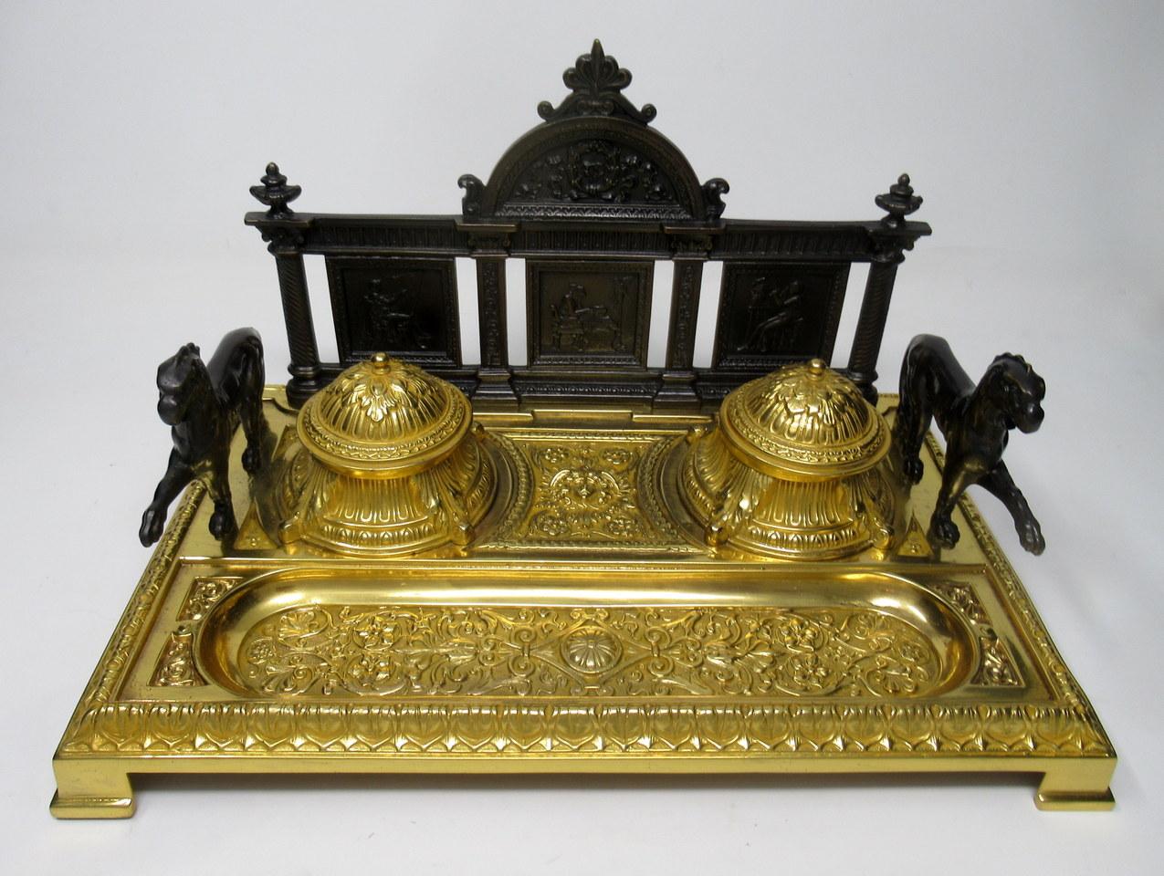 An exceptionally fine quality stylish heavy gauge gilt bronze inkstand desk set of generous proportions and of french origin. Third quarter of the 19th century.

Cast in the Adams style with bronze panels to rear depicting the Arts, flanked by two