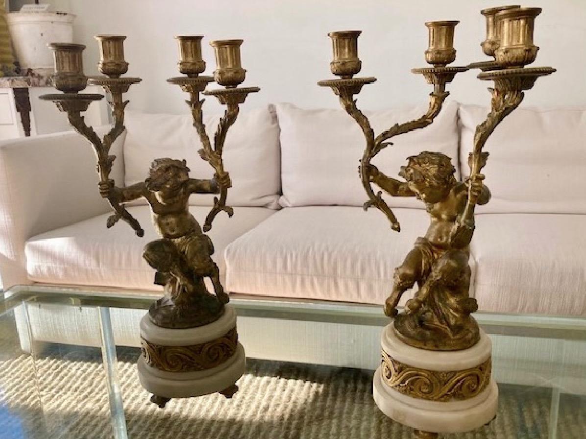 French Provincial French Gilt Bronze Pan Putti Candelabras, a Pair For Sale