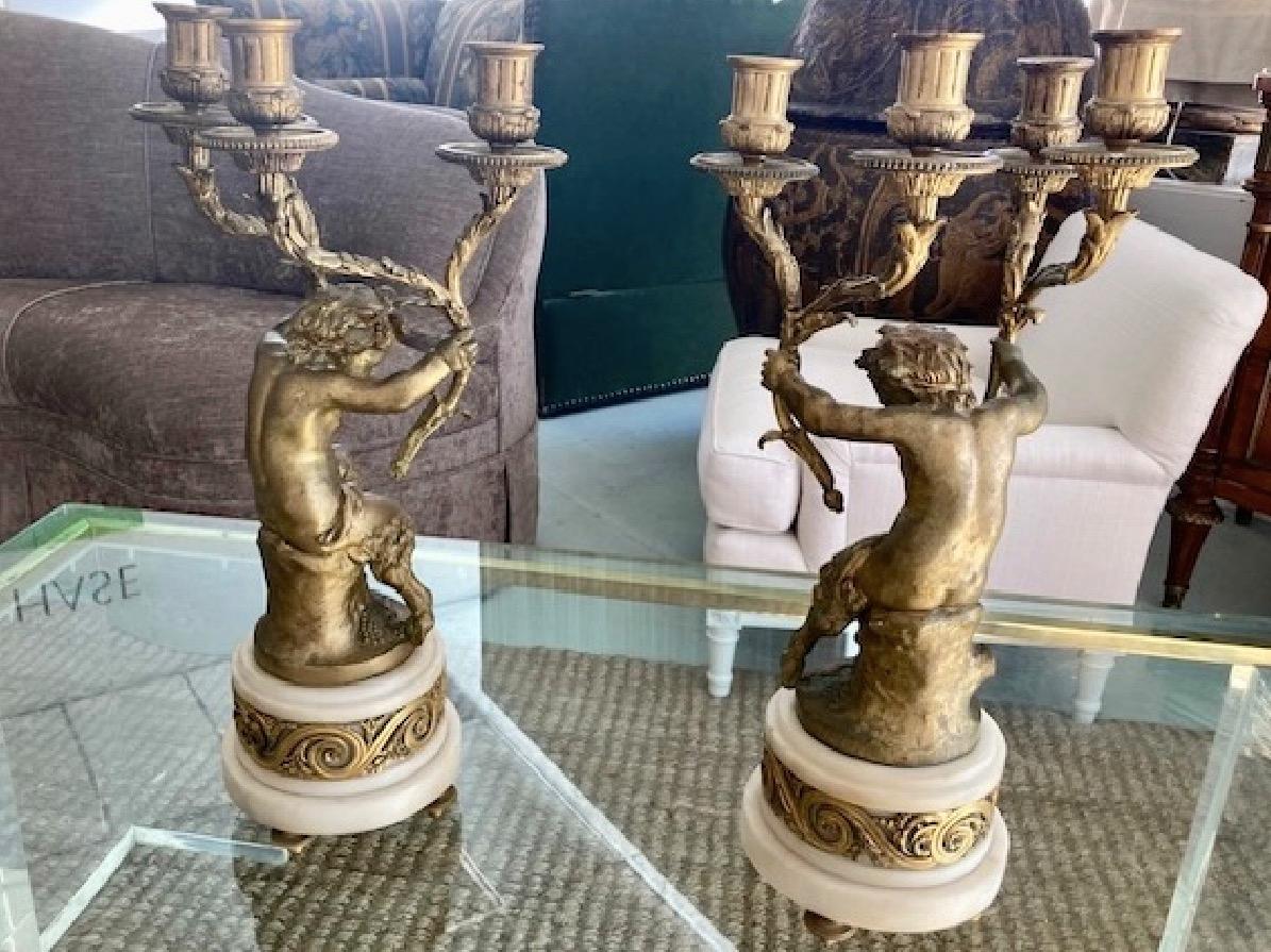 French Gilt Bronze Pan Putti Candelabras, a Pair In Good Condition For Sale In Los Angeles, CA