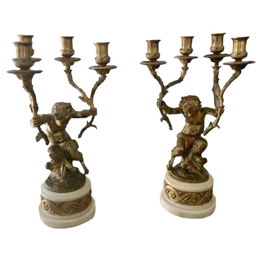 French Gilt Bronze Pan Putti Candelabras, a Pair For Sale
