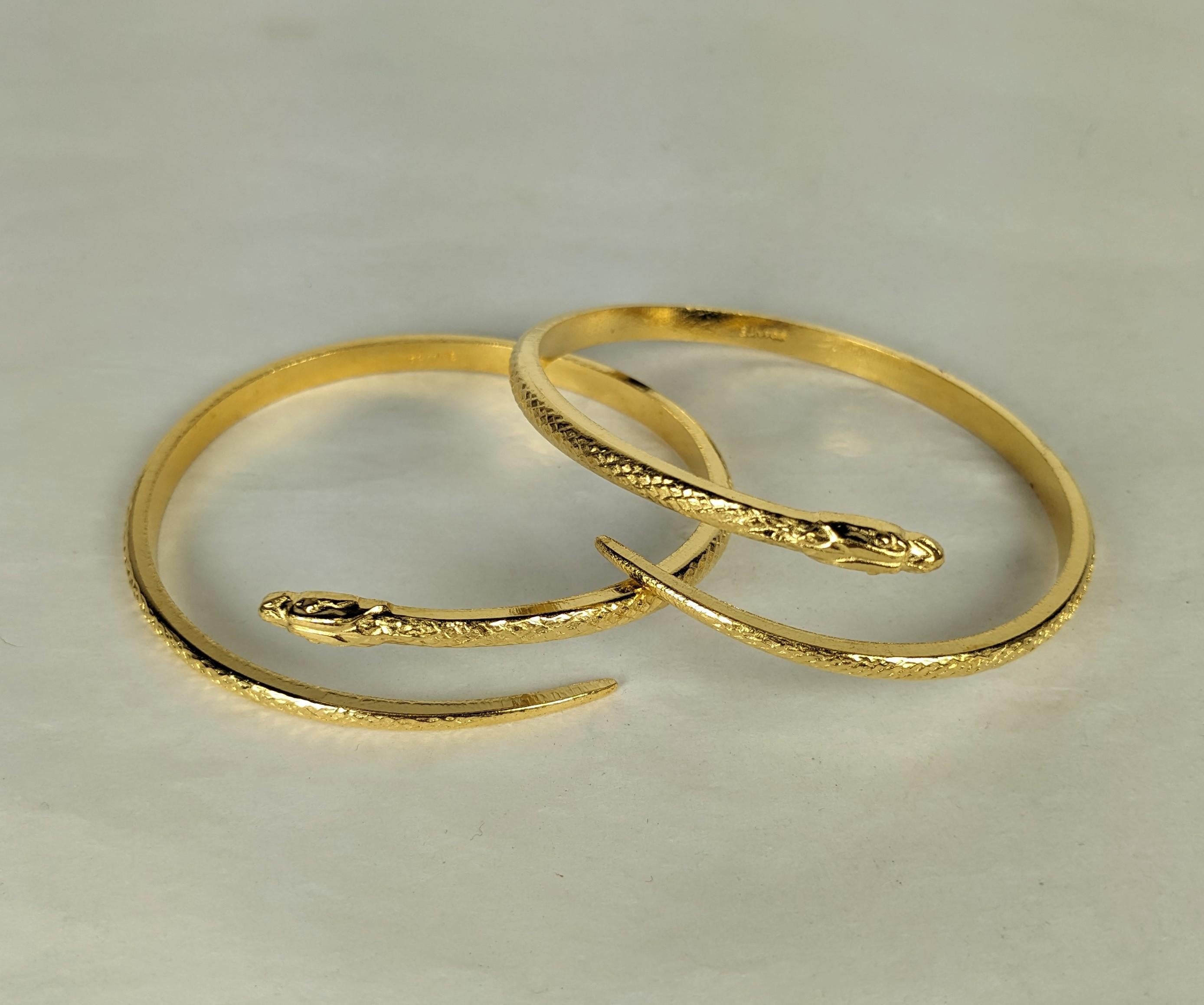 Pair of French Victorian Revival 1960's wrap snake bangle bracelets of finely detailed, incised gilded brass. Wear stacked together or alone. New old stock, Made in France. Excellent Condition. Marked France
Interior diameter 2.5