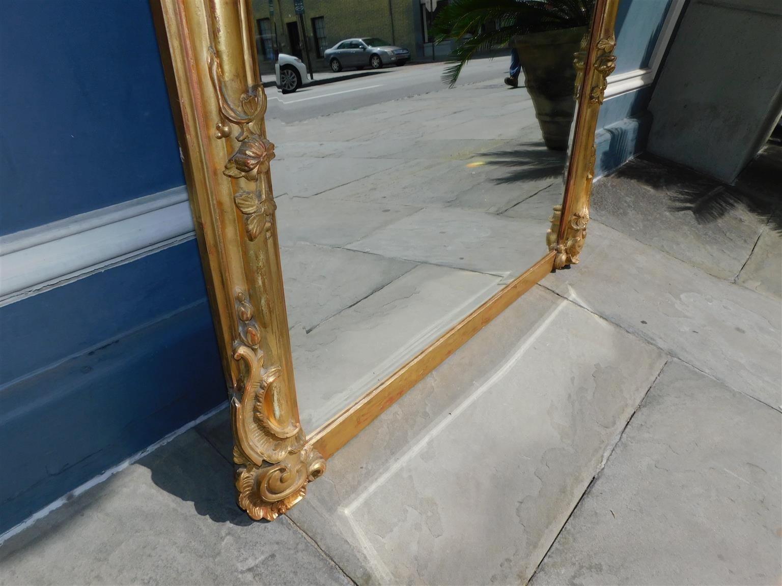 Early 19th Century French Gilt Carved Wood and Gesso Foliage Wall Mirror with Beveled Glass C. 1820
