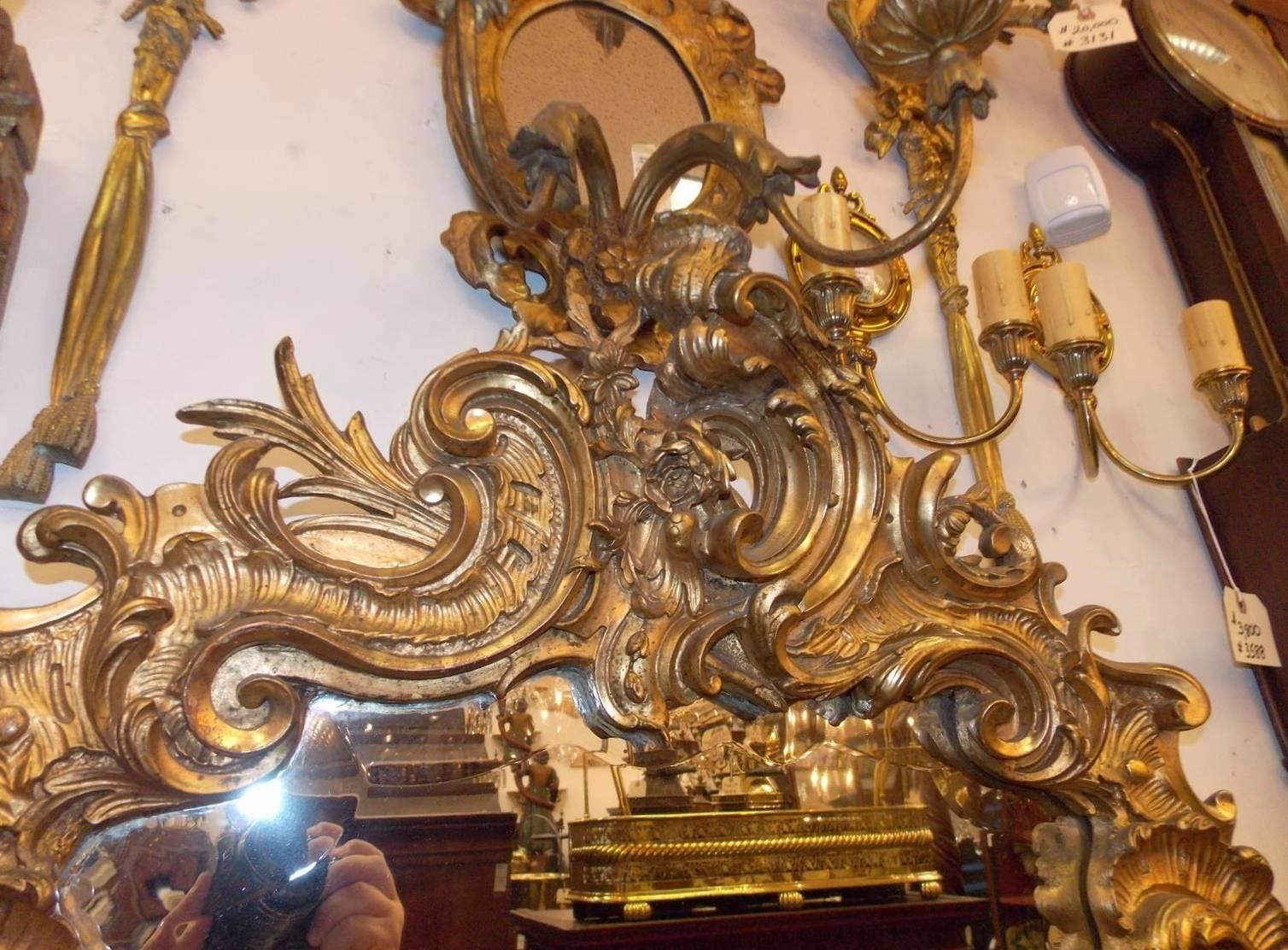 Louis Philippe French Gilt Carved Wood Foilage and Beveled Decorative Wall Mirror, Circa 1820