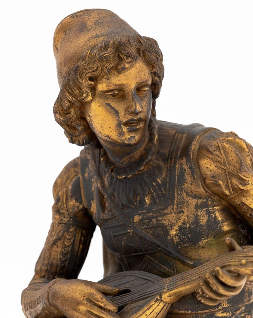 French Gilt Cast Metal Lute Player, seated on a column and foot stool in Renaissance period costume. 11.5