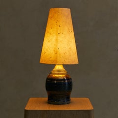 French Gilt Ceramic Table Lamp with Paper Shade by Georges Pelletier, 1960s