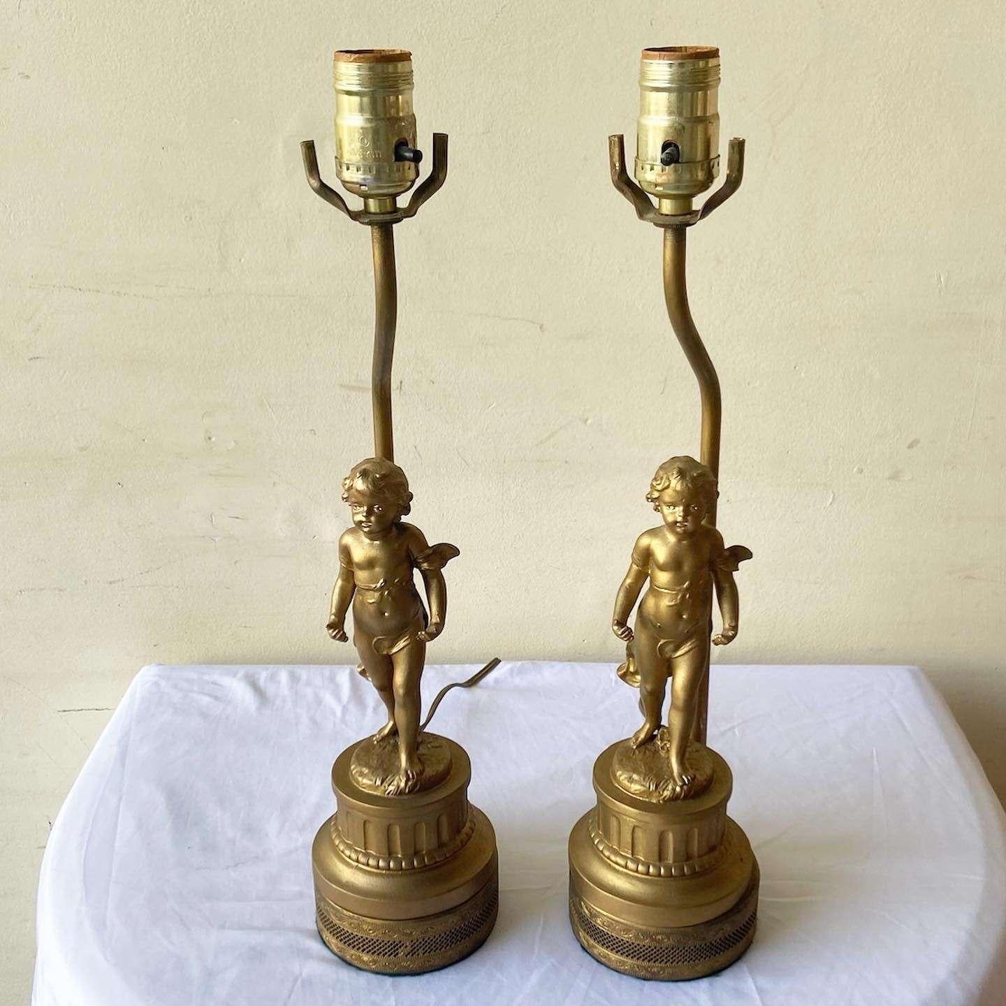 Mid-20th Century French Gilt Cherub Figural Torch Table Lamps - a Pair For Sale