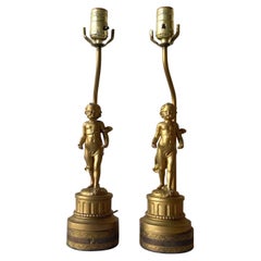 Antique French Gilt Cherub Figural Torch Table Lamps - a Pair