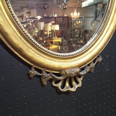 French Gilt Cherub Oval Bevelled Mirror, 19th Century